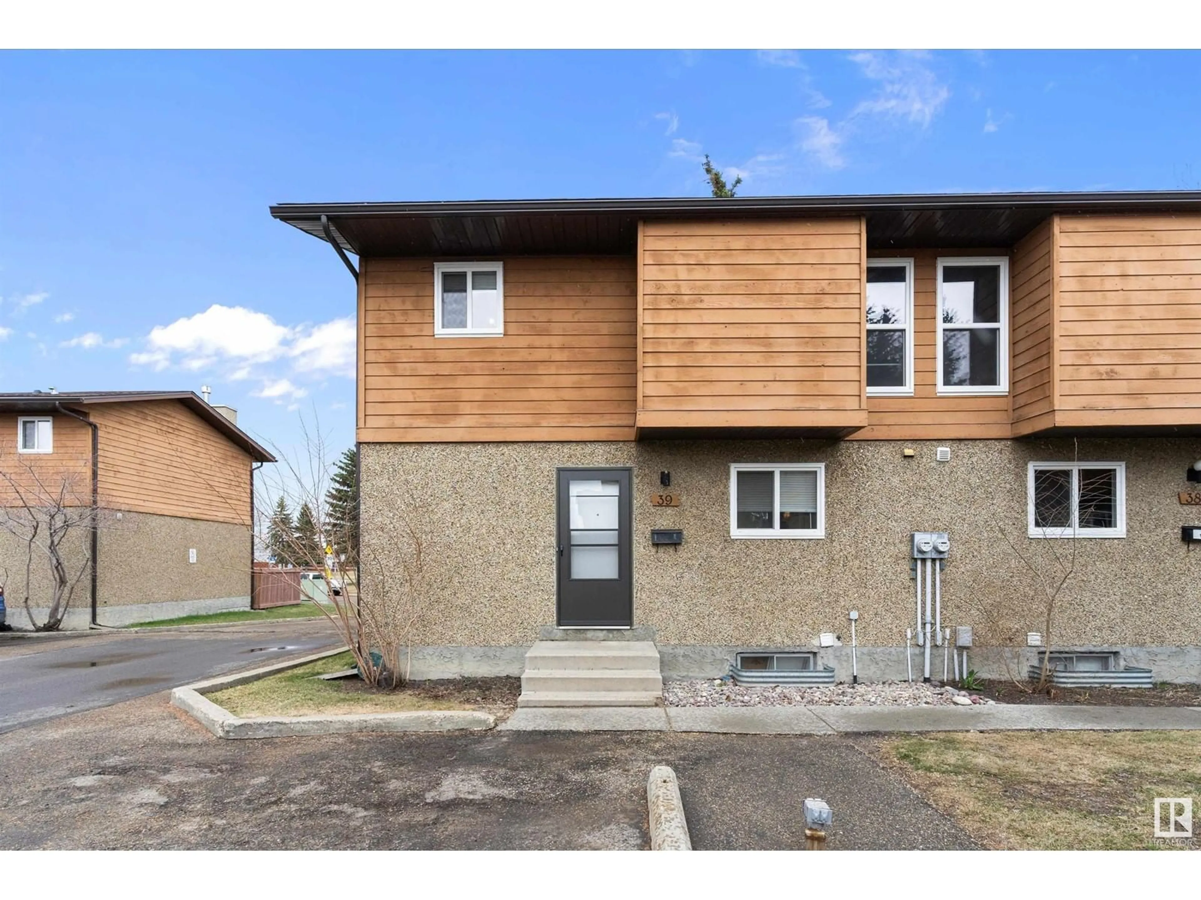 Home with brick exterior material, street for 39 - 3812 20 AV, Edmonton Alberta T6L4B2