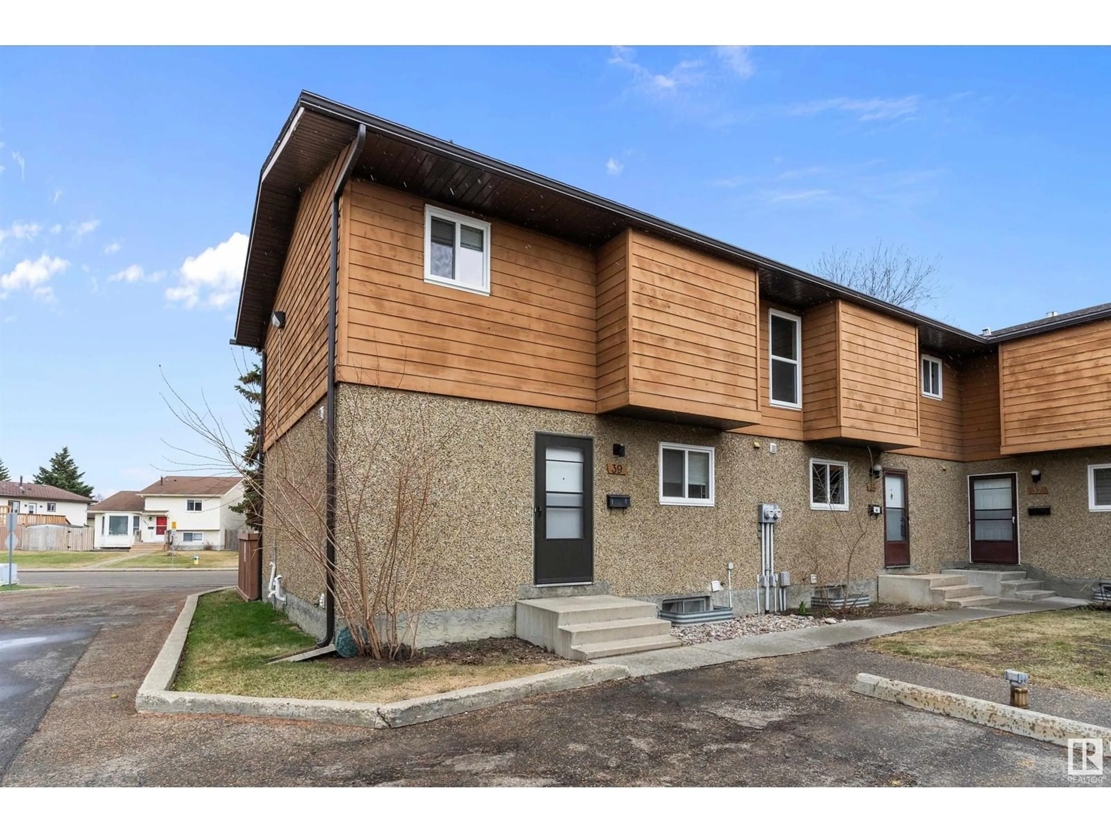 Home with brick exterior material, street for 39 - 3812 20 AV, Edmonton Alberta T6L4B2