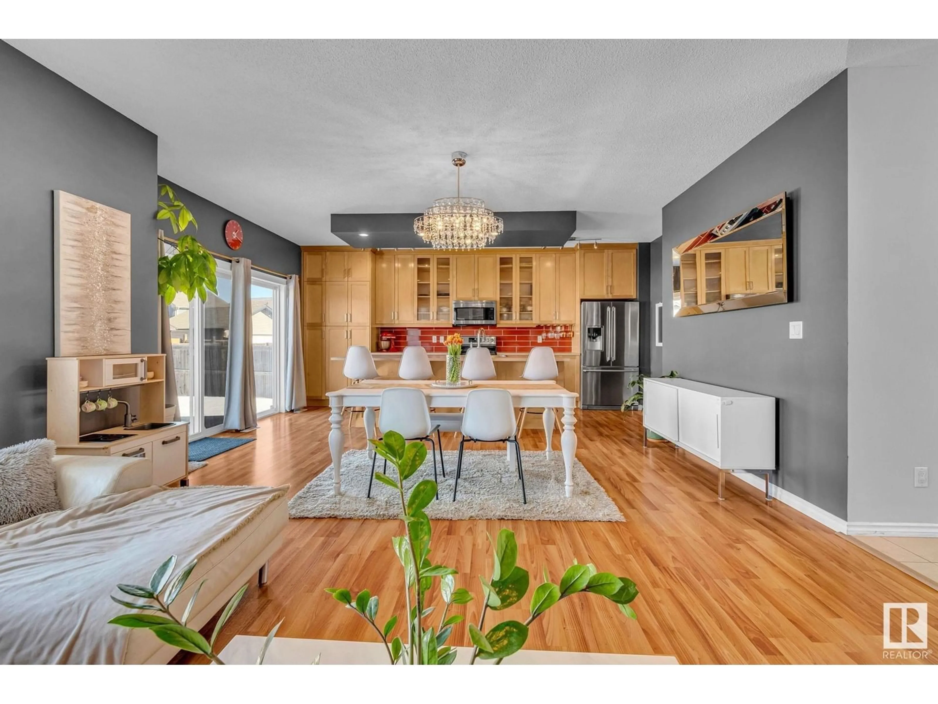 Open concept kitchen, wood/laminate floor for 5816 168 AV, Edmonton Alberta T5Y0K6