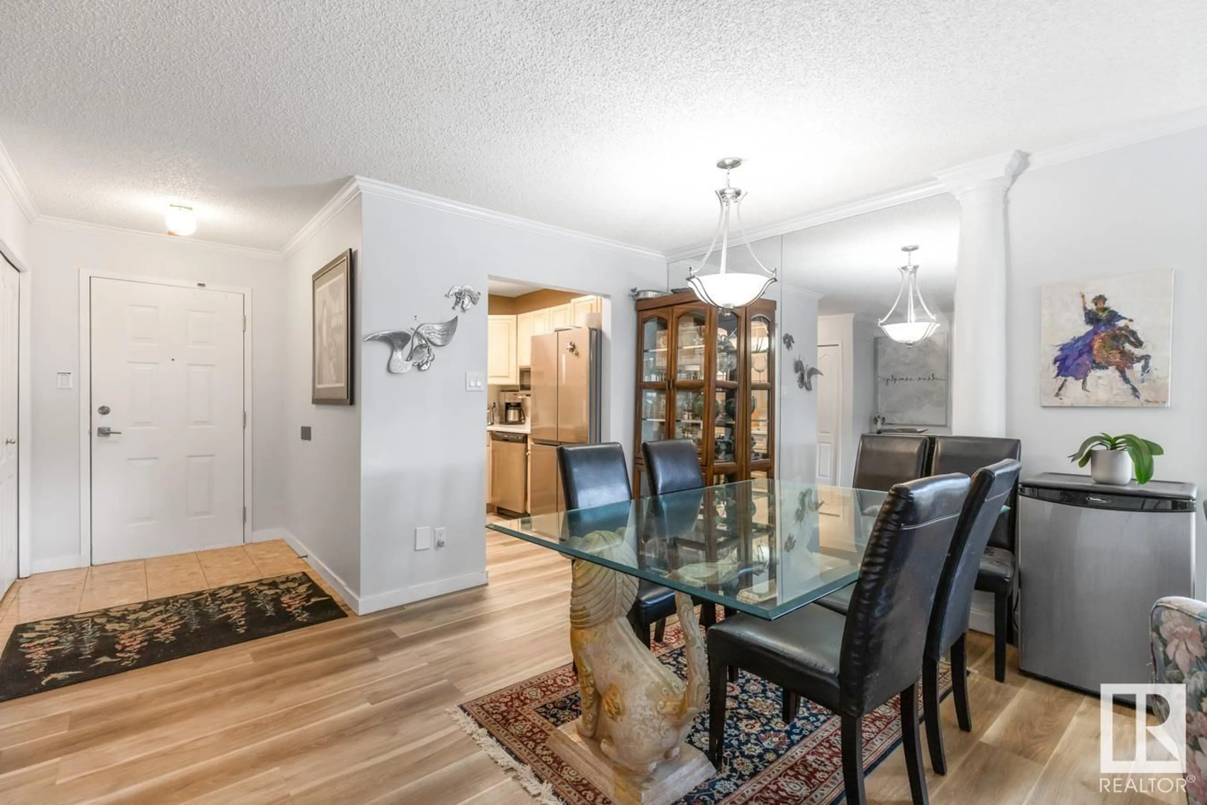 Dining room, wood/laminate floor for #103 - 17151 94A AV NW, Edmonton Alberta T5T5Z9
