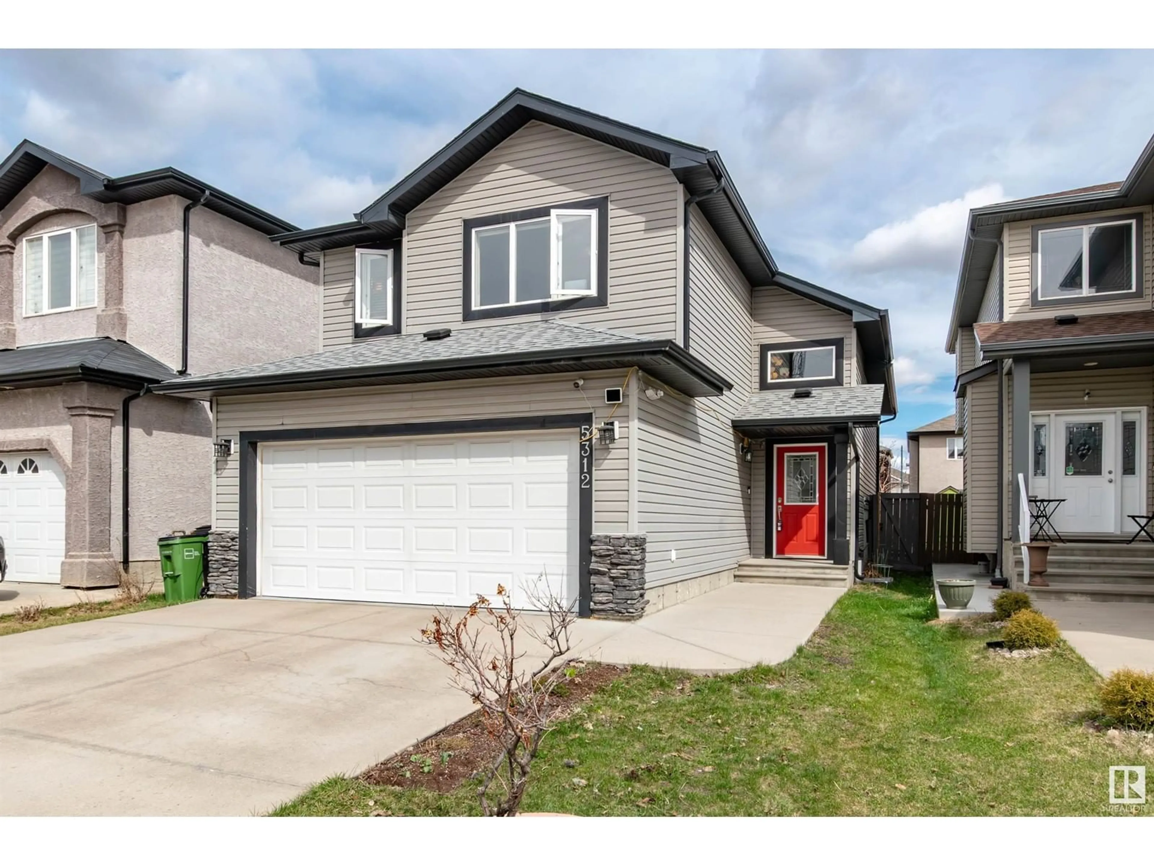 Home with vinyl exterior material, street for 5312 164 AV, Edmonton Alberta T5Y0H4