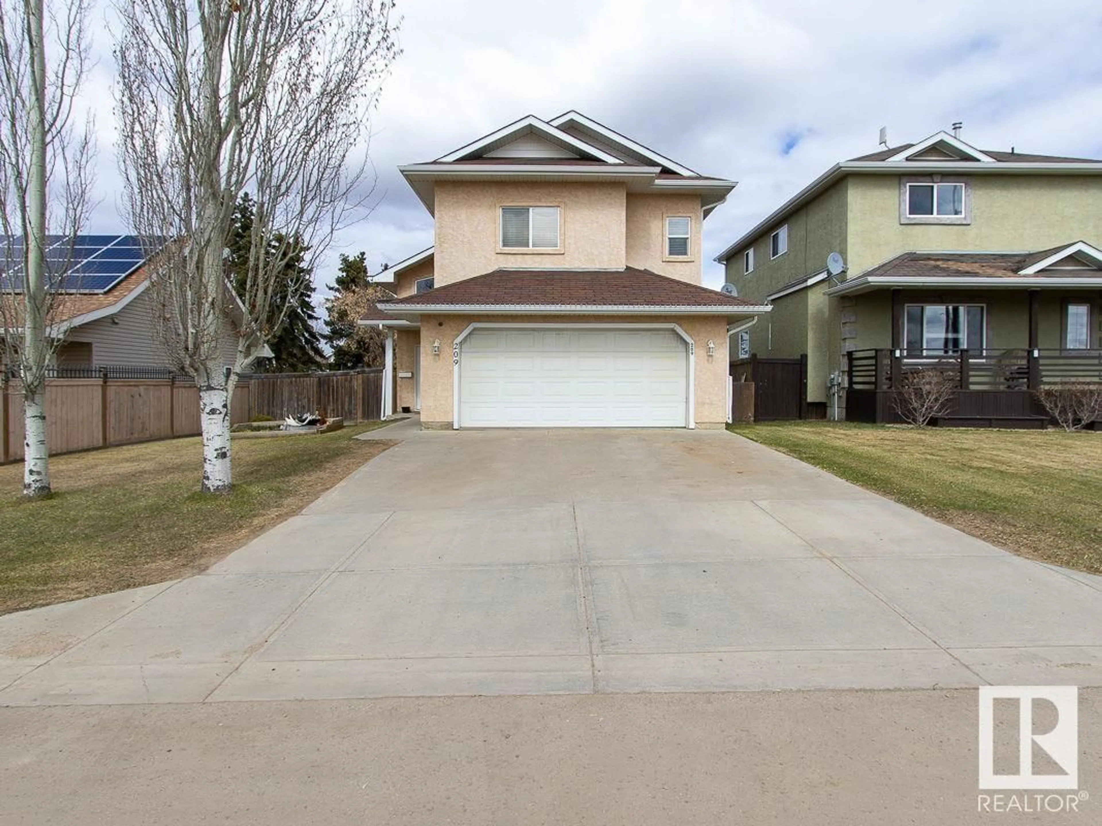 Home with vinyl exterior material, street for 209 - 25100 TWP ROAD 554, Cardiff Alberta T8R2G5