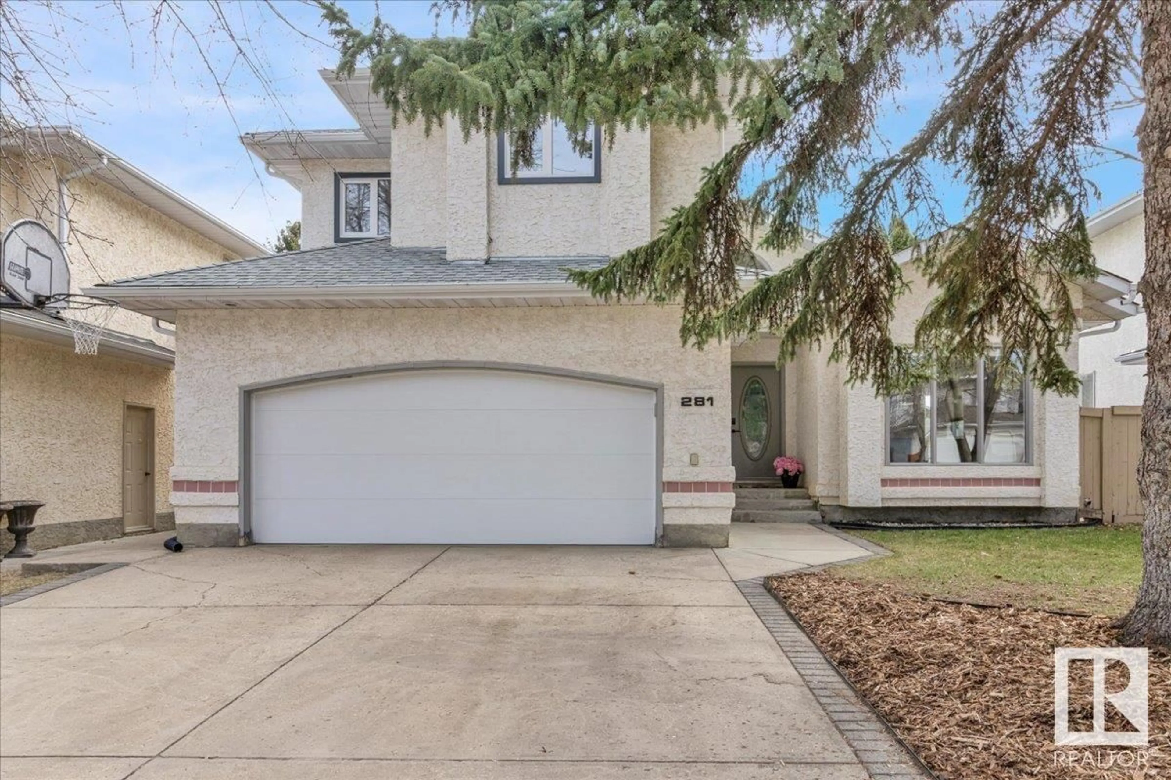 Home with vinyl exterior material, street for 281 HEATH RD, Edmonton Alberta T6R1V4