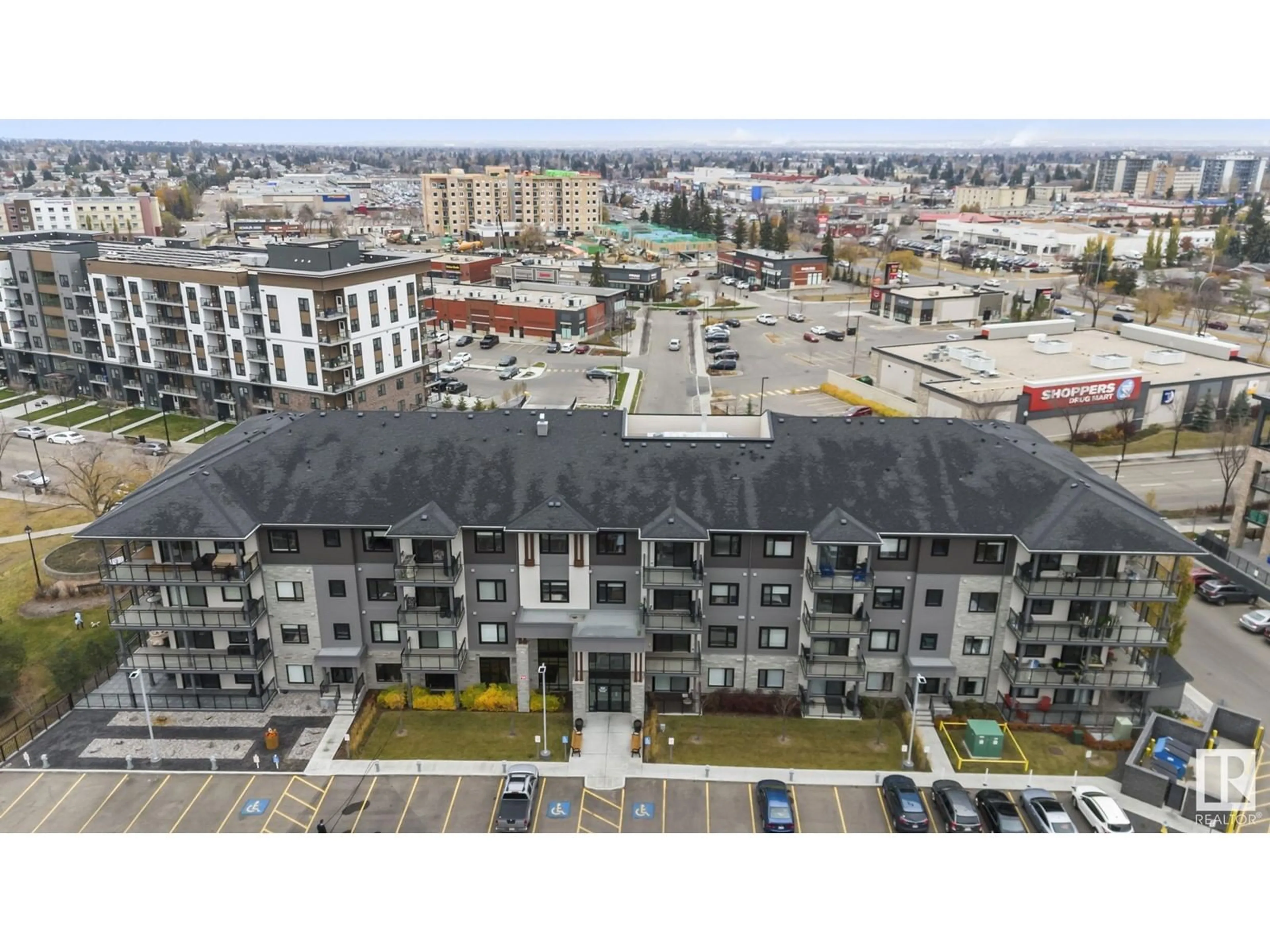 A pic from outside/outdoor area/front of a property/back of a property/a pic from drone, unknown for #223 - 524 GRIESBACH PR, Edmonton Alberta T5E6X2