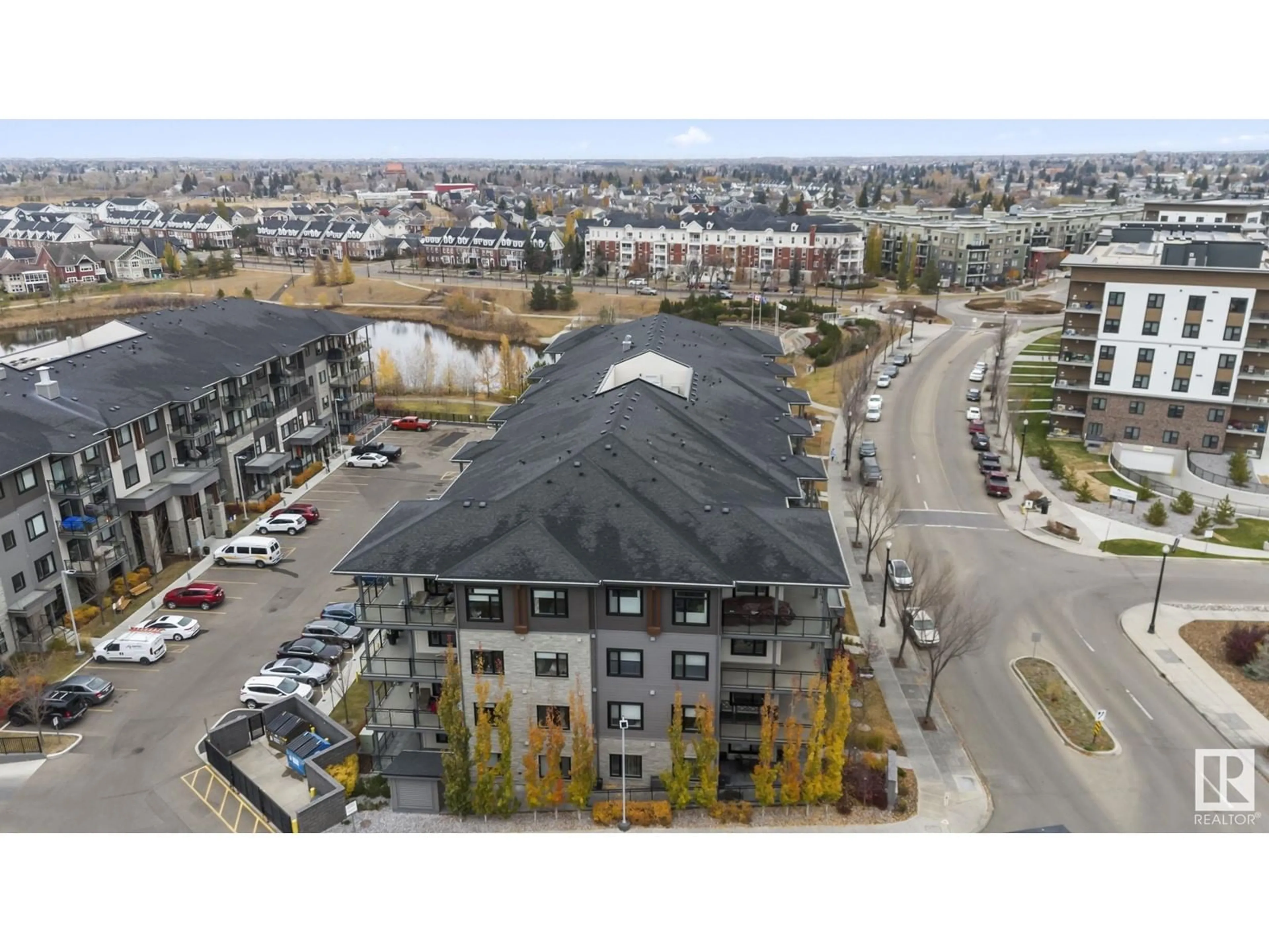 A pic from outside/outdoor area/front of a property/back of a property/a pic from drone, unknown for #223 - 524 GRIESBACH PR, Edmonton Alberta T5E6X2