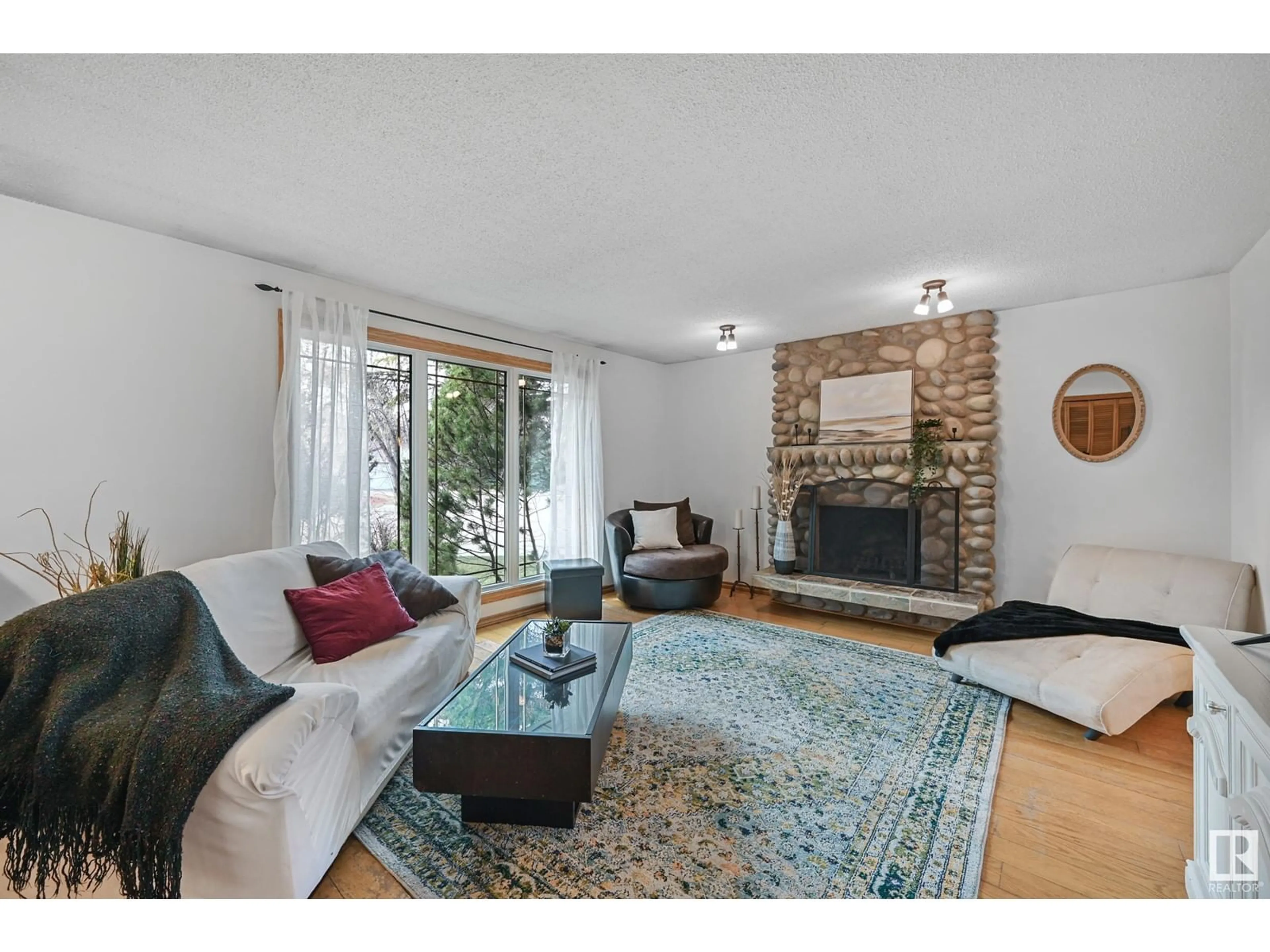 Living room with furniture, unknown for NW - 11212 22 AV, Edmonton Alberta T6J4V3