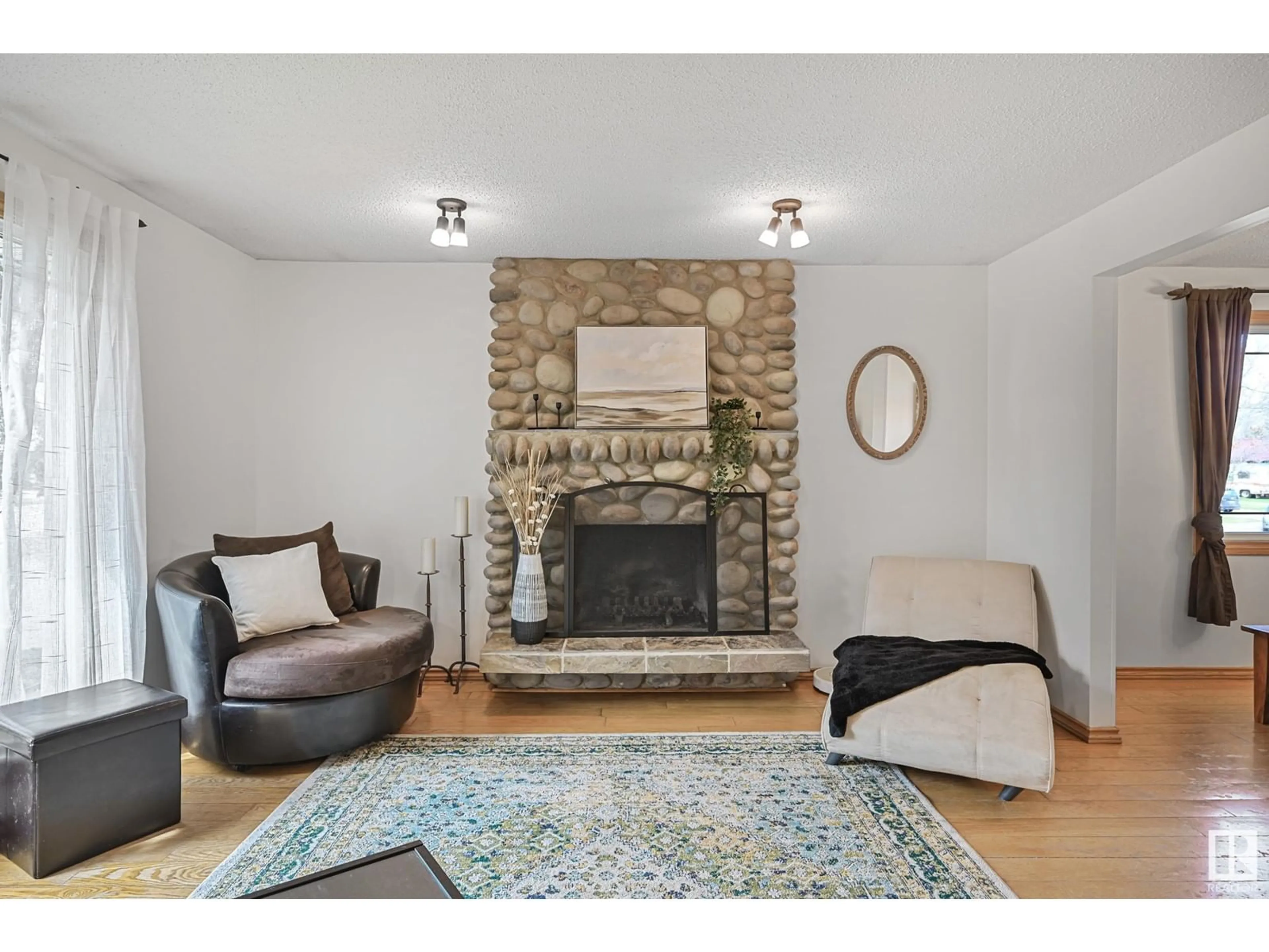 Living room with furniture, unknown for NW - 11212 22 AV, Edmonton Alberta T6J4V3