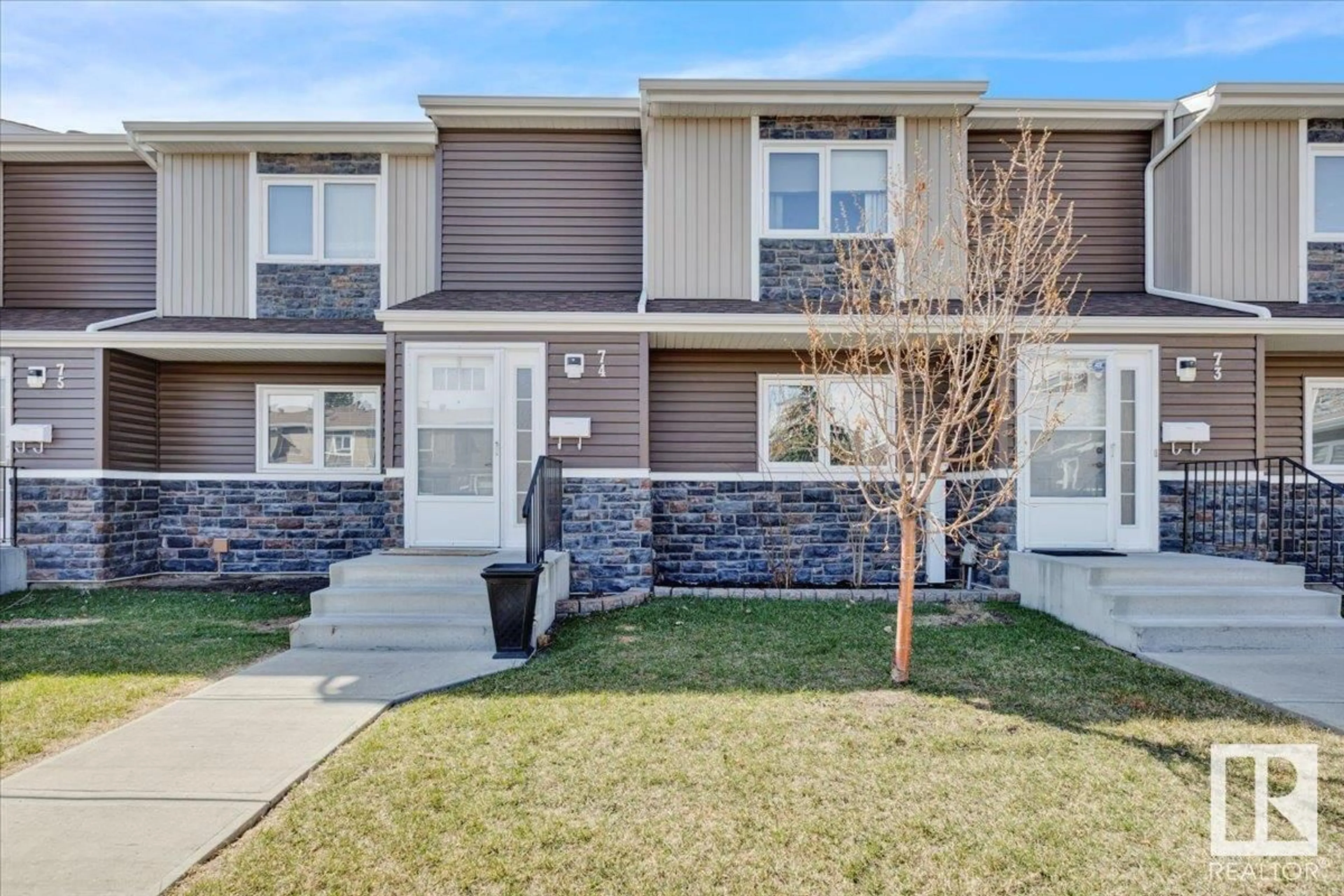 Home with vinyl exterior material, street for #74 - 3115 119 STREET, Edmonton Alberta T6J5N5