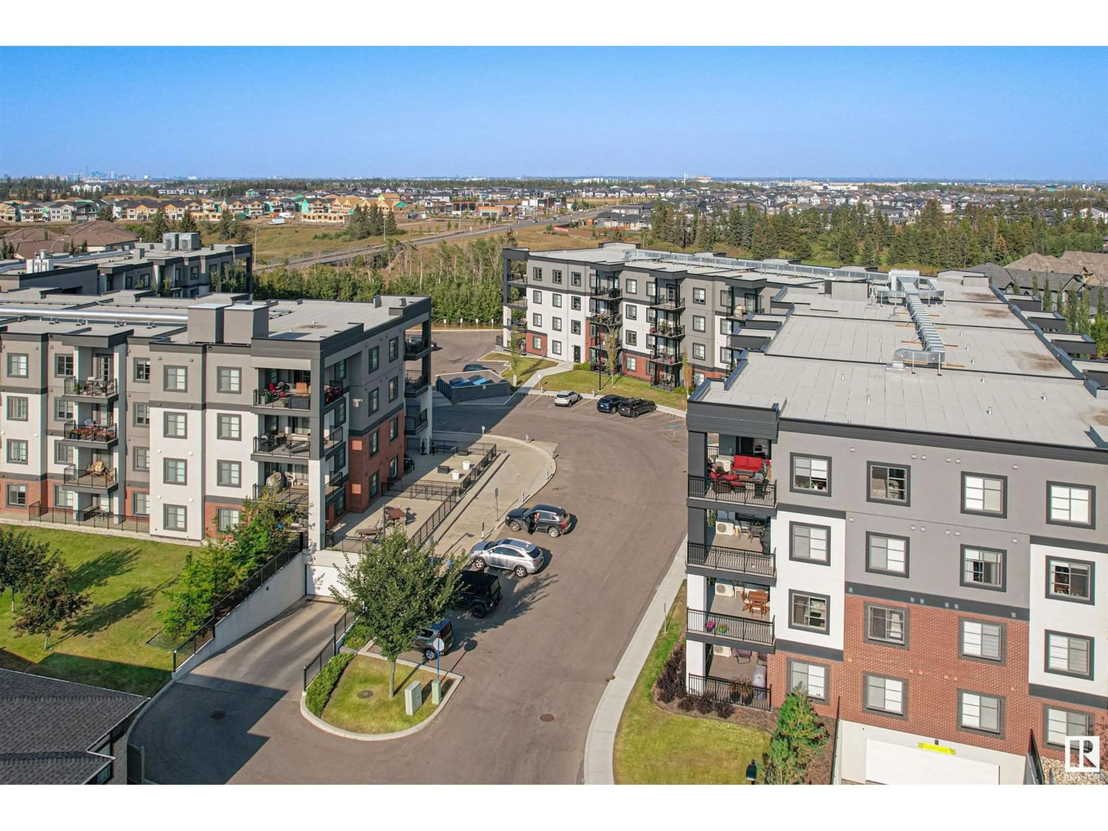 A pic from outside/outdoor area/front of a property/back of a property/a pic from drone, unknown for 1154 - 340 ADAMSON DR, Edmonton Alberta T6W3N5