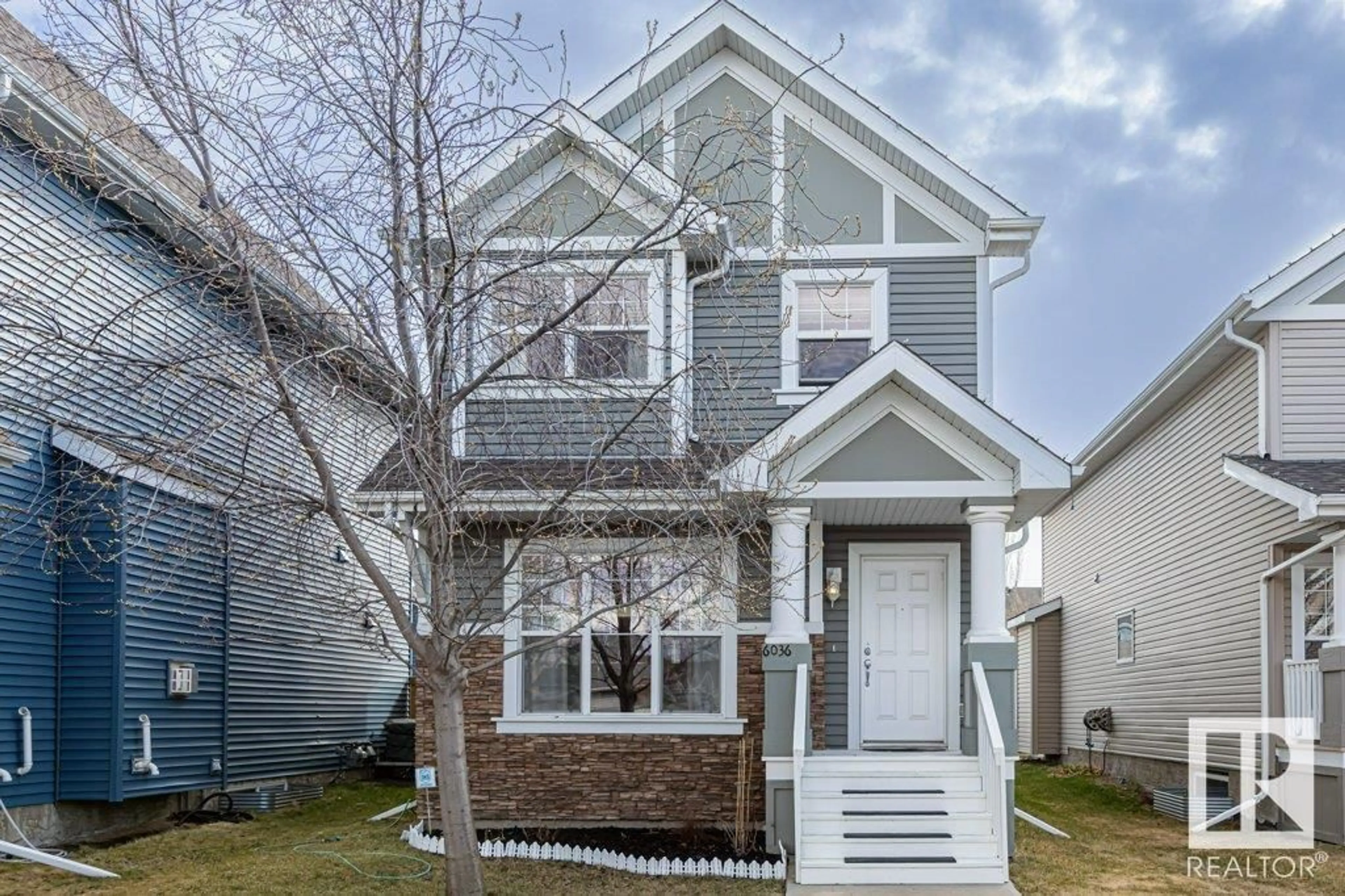 Home with vinyl exterior material, street for 6036 STANTON DR, Edmonton Alberta T6X0H1