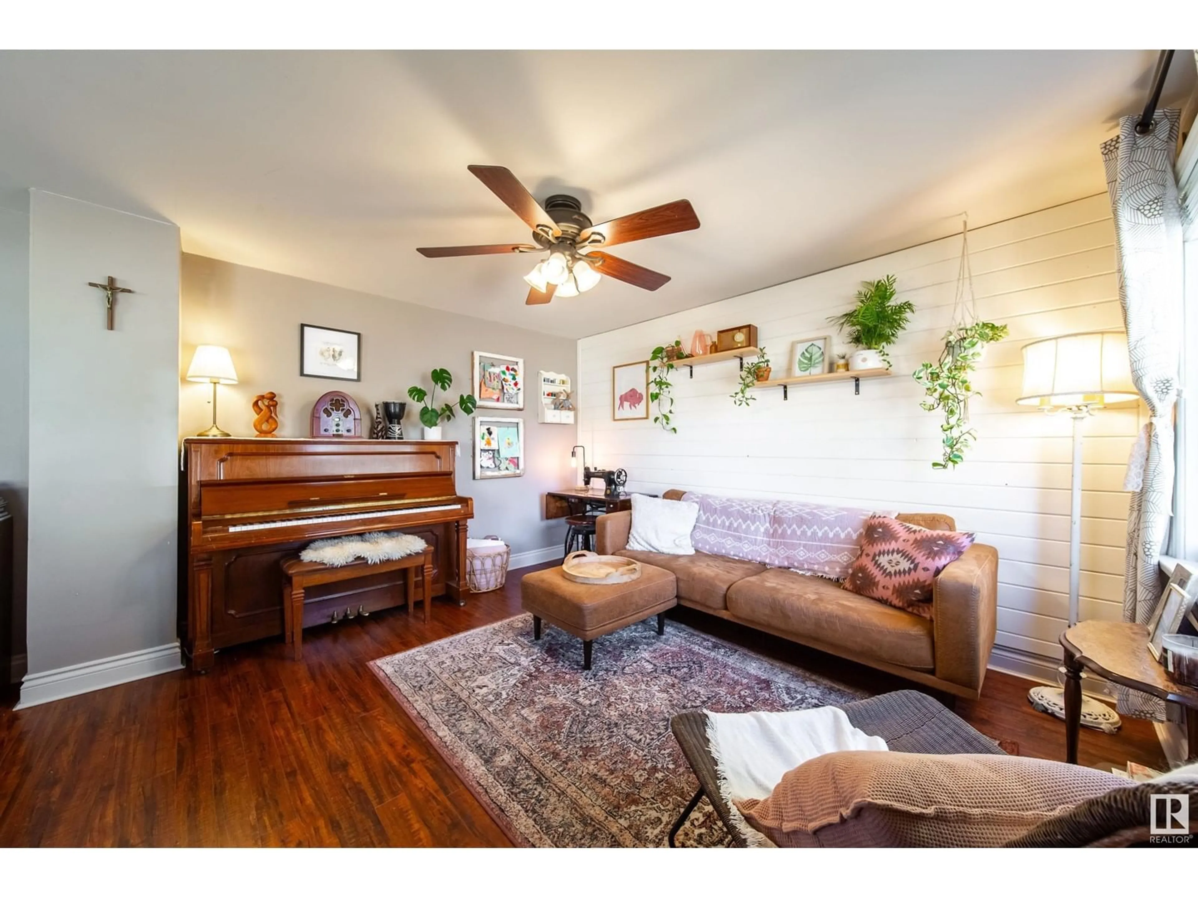 Living room with furniture, wood/laminate floor for 11349 95A ST, Edmonton Alberta T5G1P2