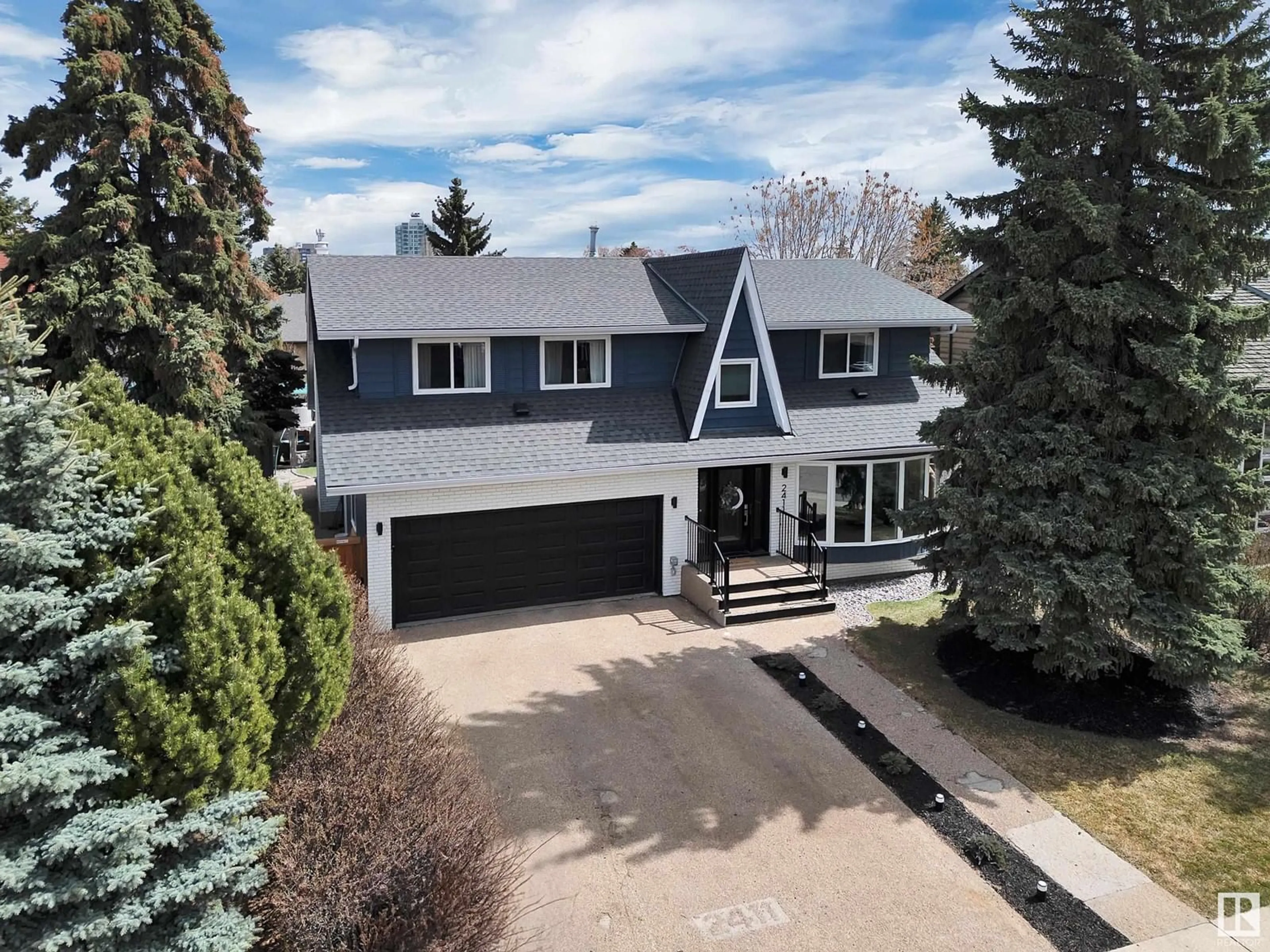 A pic from outside/outdoor area/front of a property/back of a property/a pic from drone, street for NW - 2411 112A ST, Edmonton Alberta T6J4X4