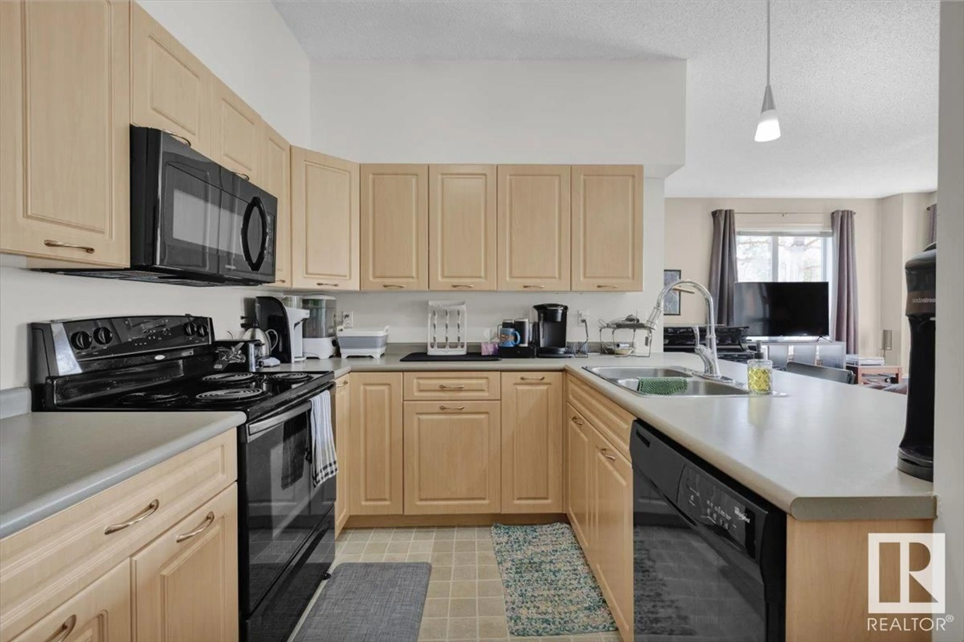 Standard kitchen, ceramic/tile floor for #110 - 6315 135 AV, Edmonton Alberta T5A5J7