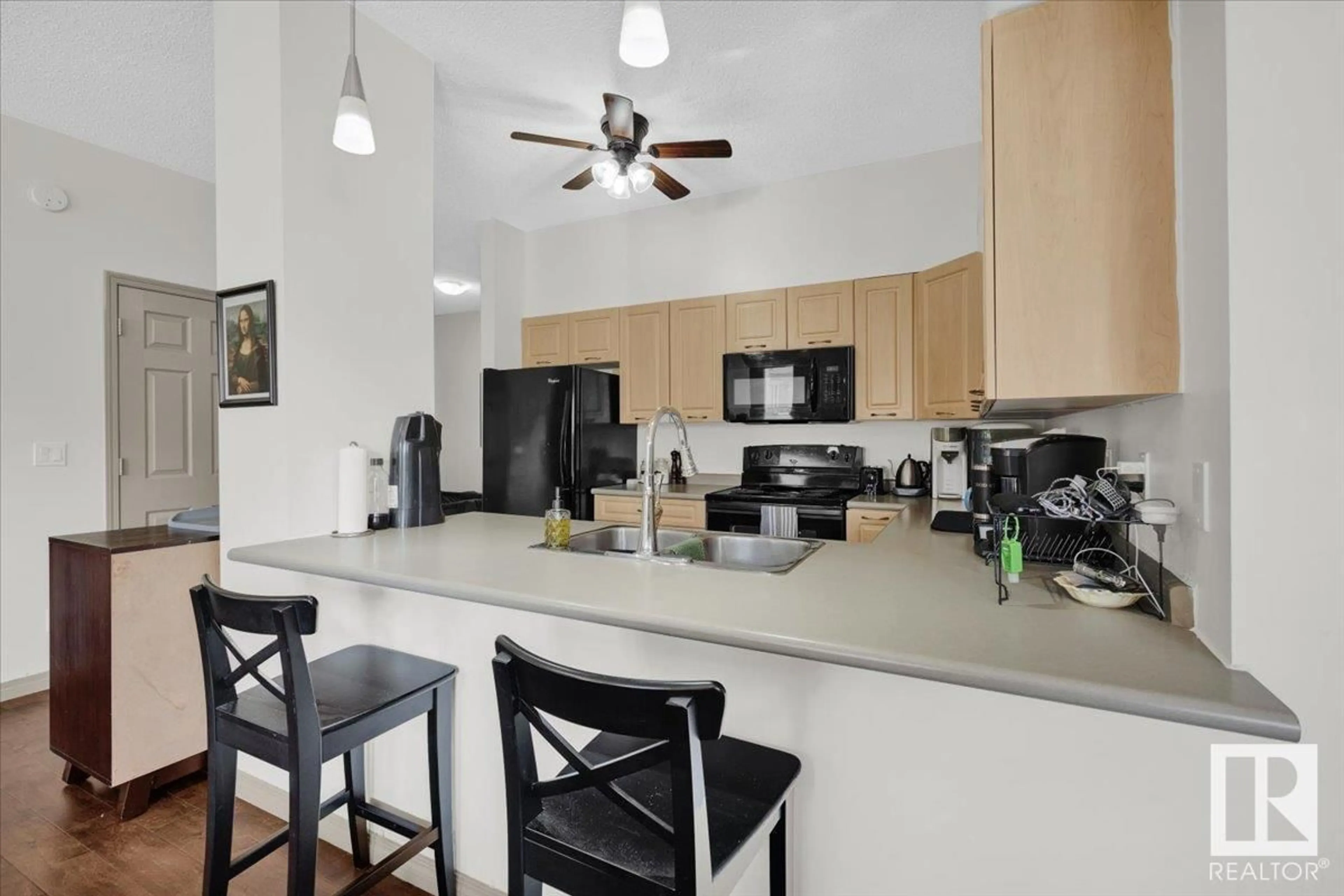 Open concept kitchen, unknown for #110 - 6315 135 AV, Edmonton Alberta T5A5J7