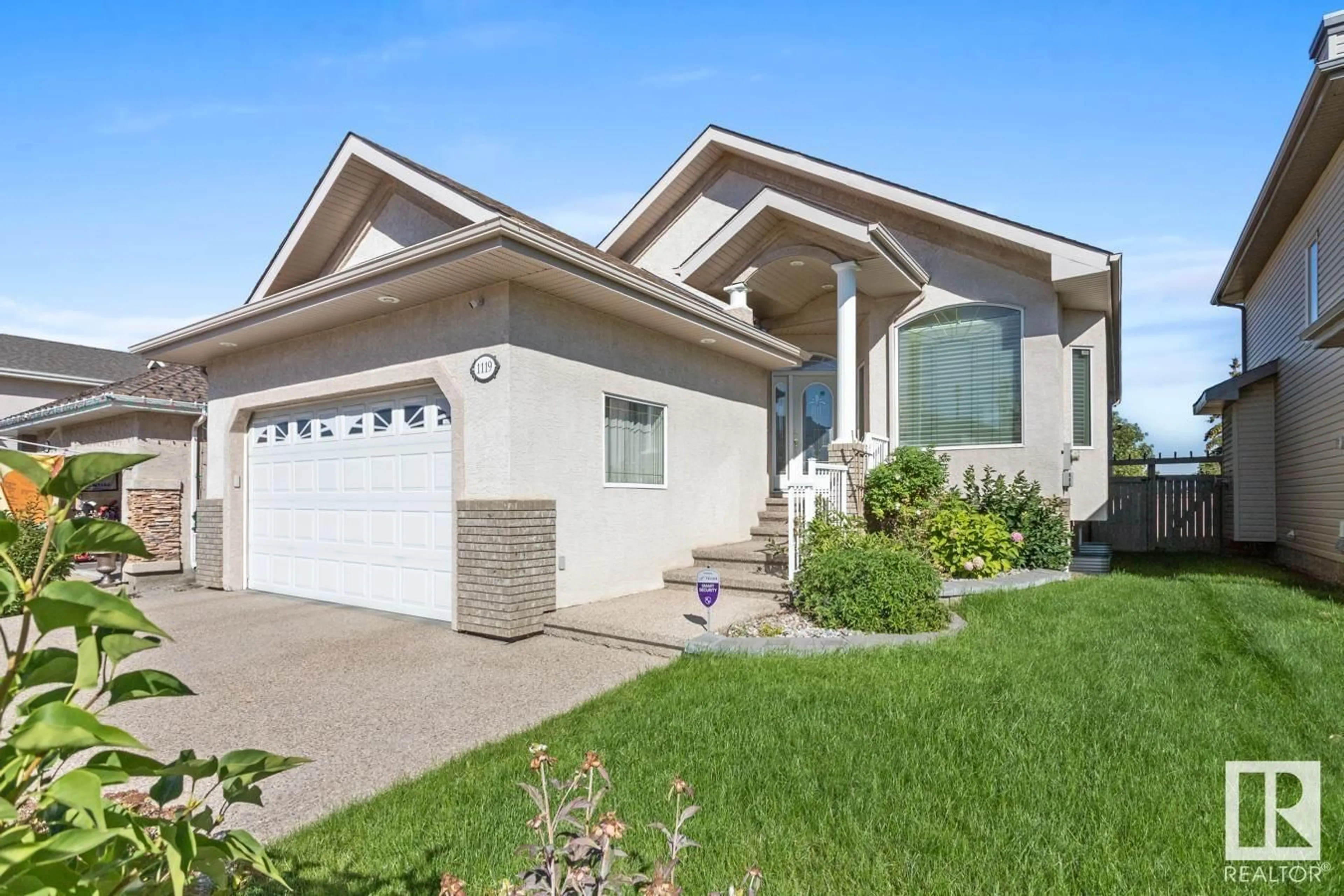 Home with vinyl exterior material, street for NW - 1119 LINCOLN CR, Edmonton Alberta T6R2Z3