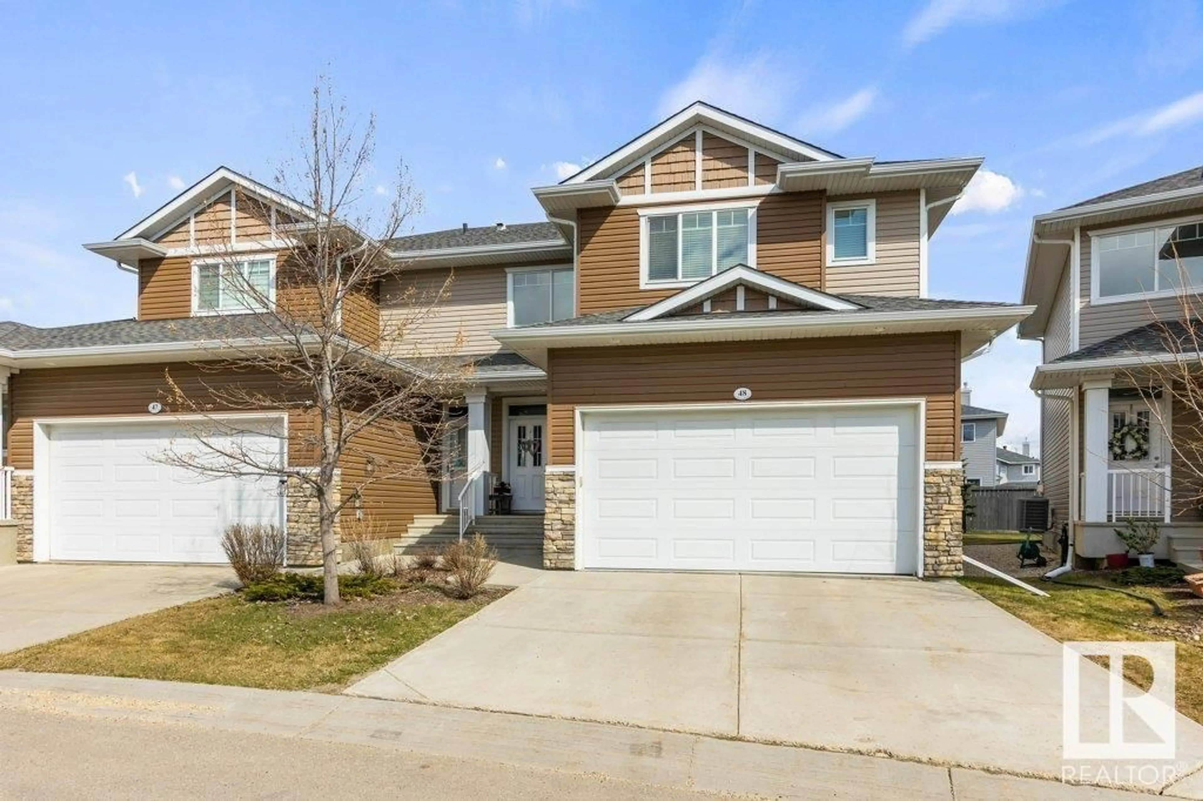 Home with brick exterior material, street for 48 18230 104A ST NW, Edmonton Alberta T5X0G9