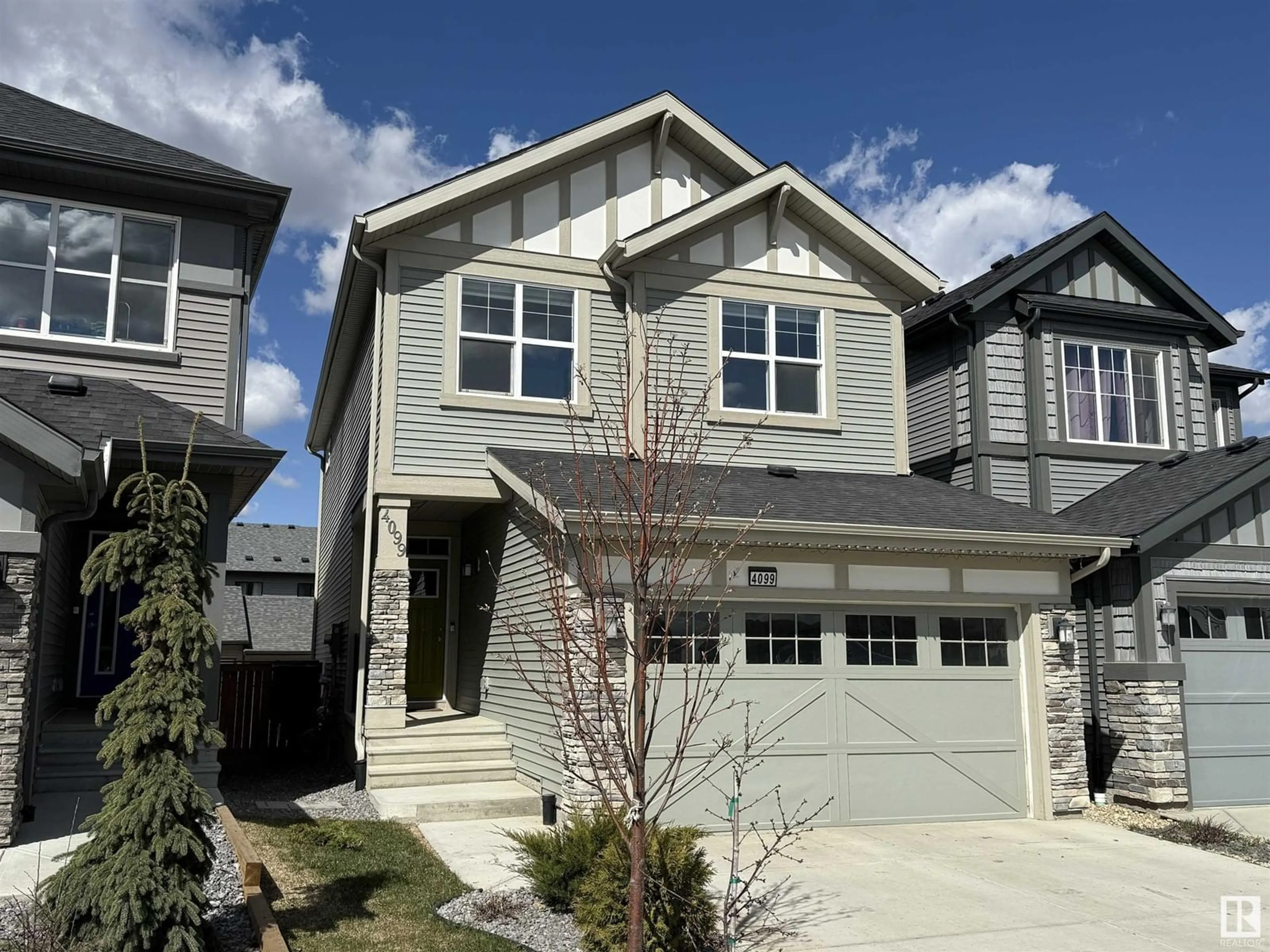 Home with vinyl exterior material, street for 4099 KINSELLA WY, Edmonton Alberta T6W4J7