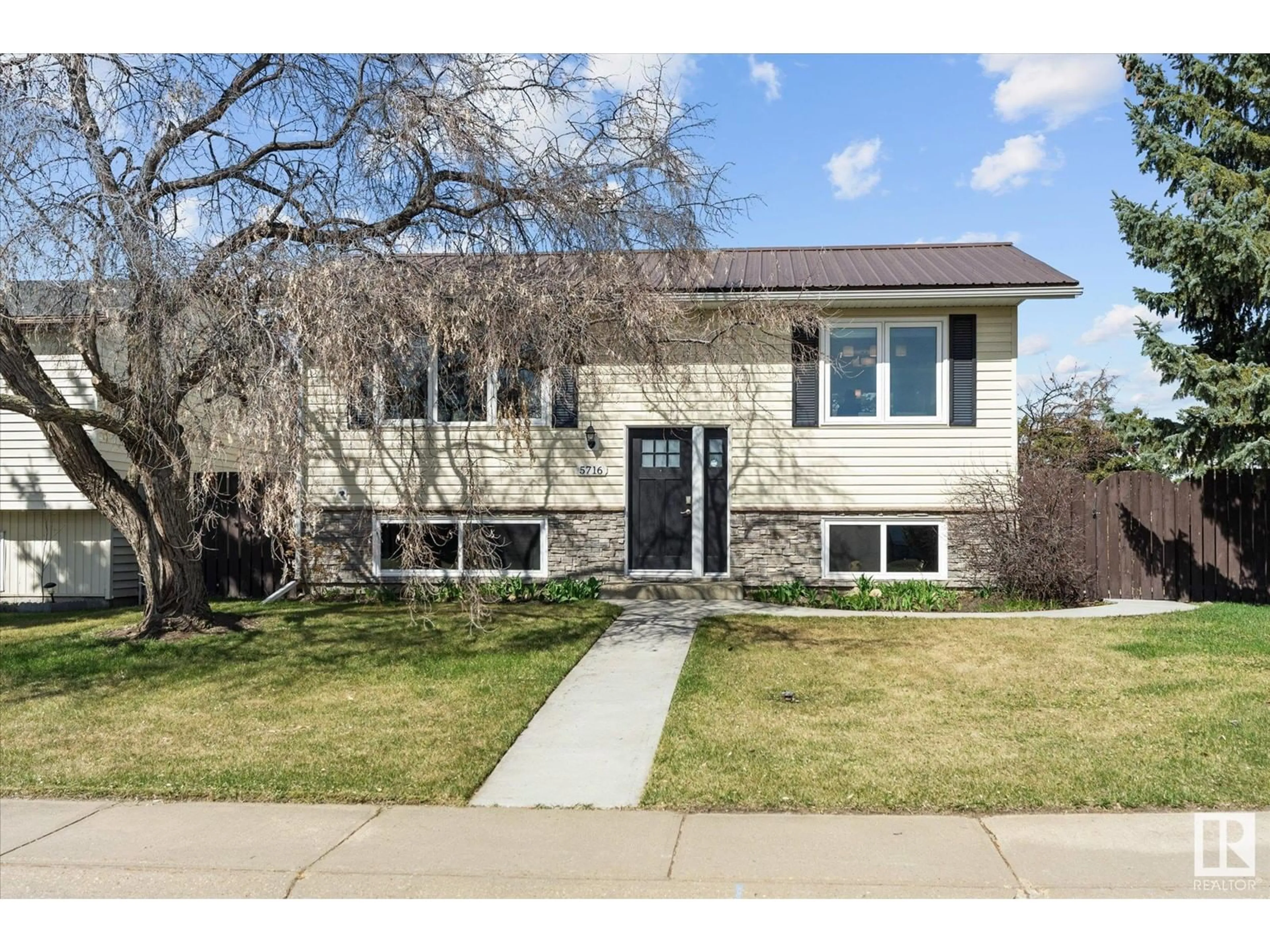 Home with brick exterior material, street for 5716 46 ST, Barrhead Alberta T7N1K5