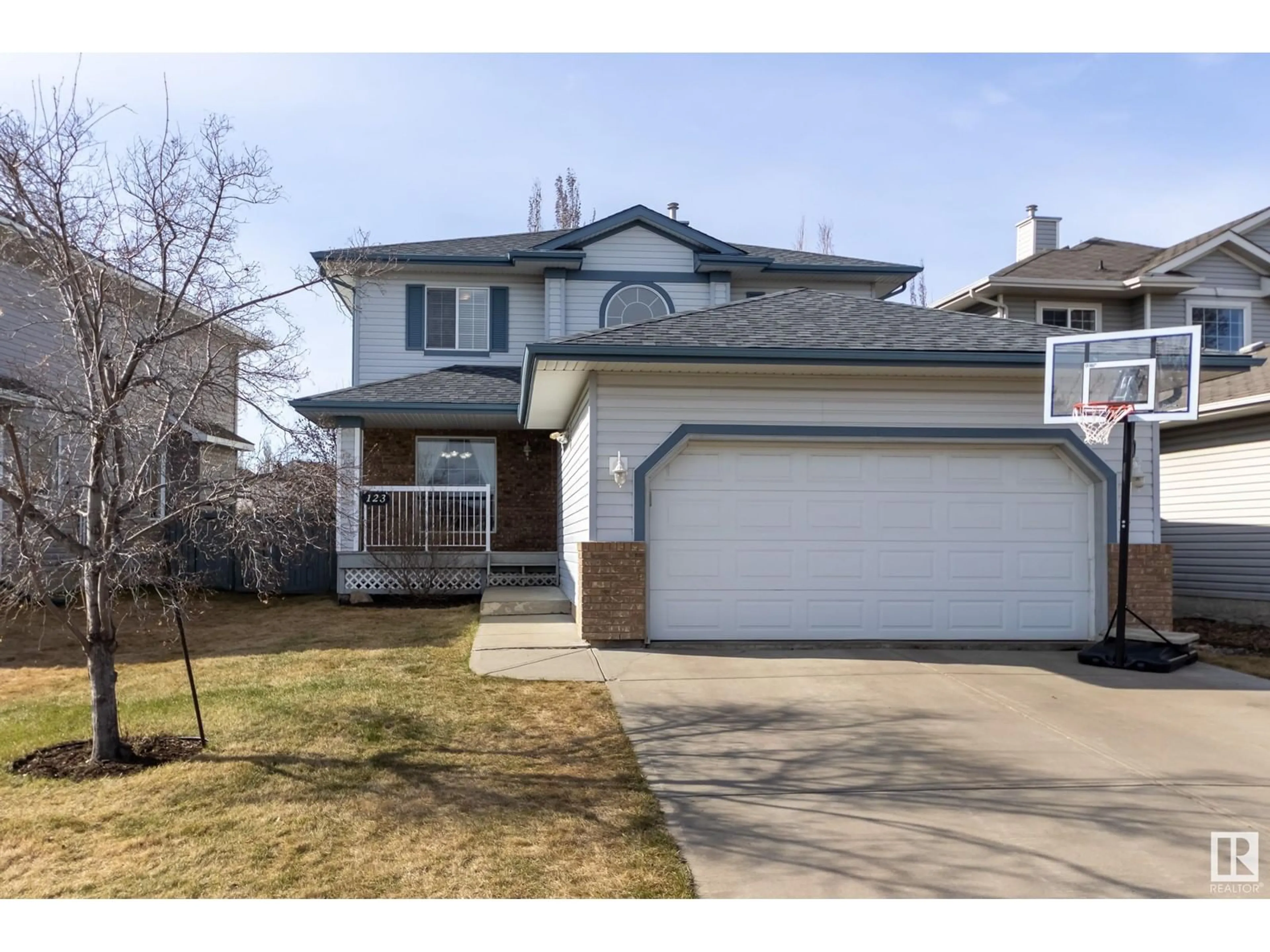 Home with vinyl exterior material, street for 123 CASTLE DR, Edmonton Alberta T5X6H1
