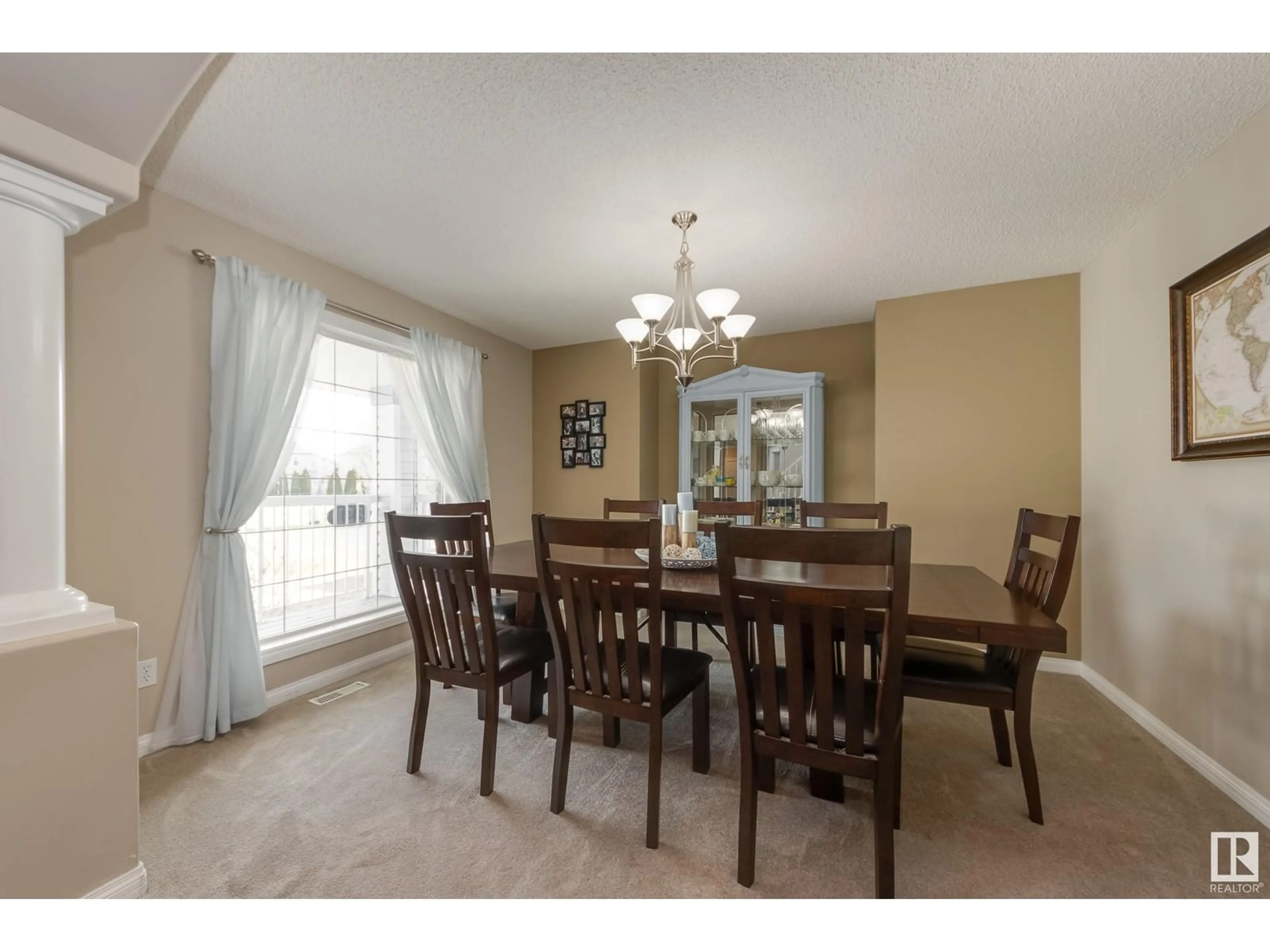 Dining room, wood/laminate floor for 123 CASTLE DR, Edmonton Alberta T5X6H1