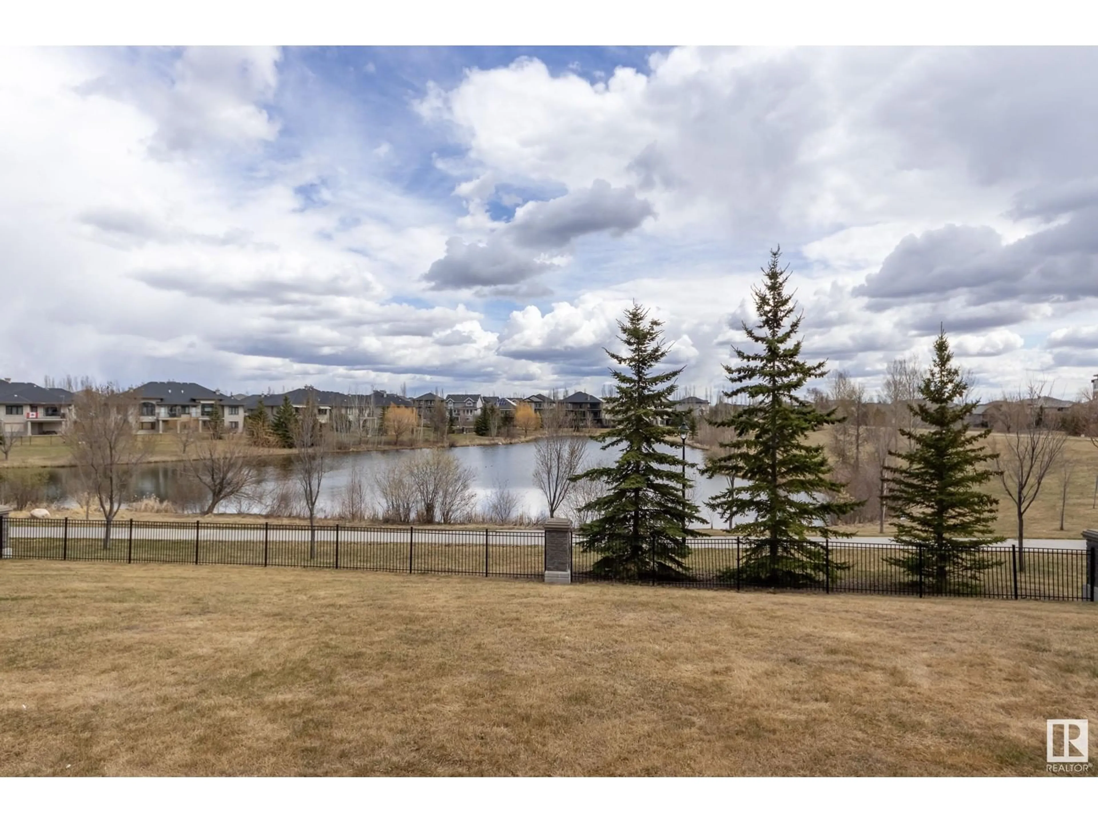 A pic from outside/outdoor area/front of a property/back of a property/a pic from drone, water/lake/river/ocean view for 6079 - 258 MAYNARD WY, Edmonton Alberta T6R0S4