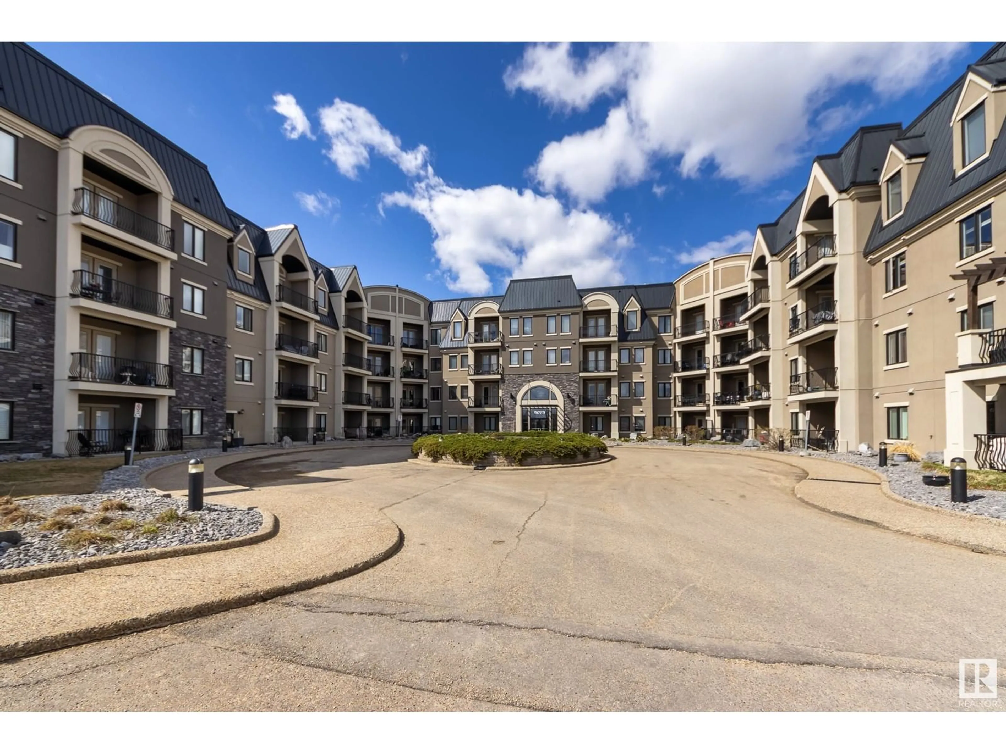 A pic from outside/outdoor area/front of a property/back of a property/a pic from drone, unknown for 6079 - 258 MAYNARD WY, Edmonton Alberta T6R0S4