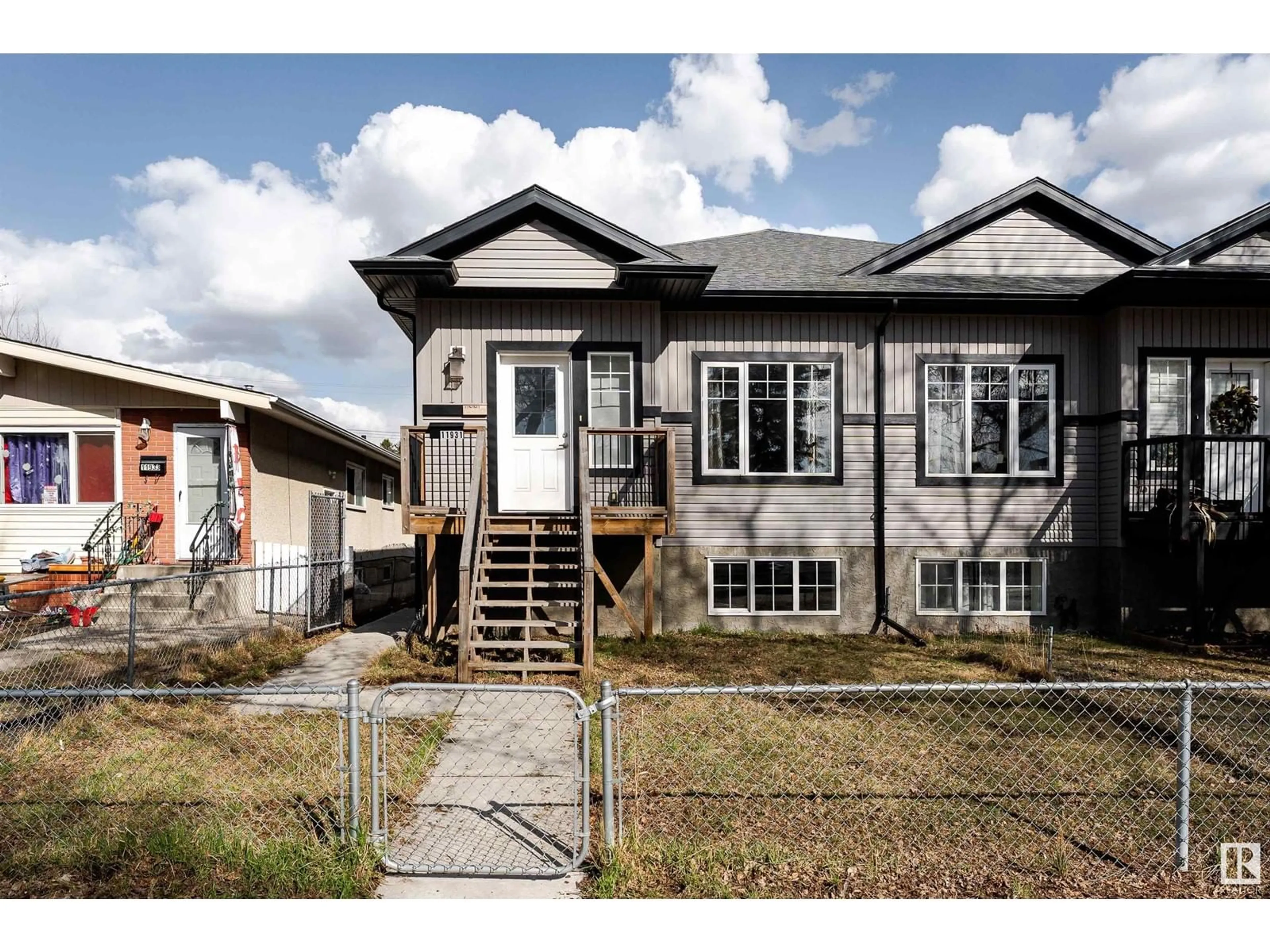 Home with vinyl exterior material, street for NW - 11931 88 ST, Edmonton Alberta T5B3S2