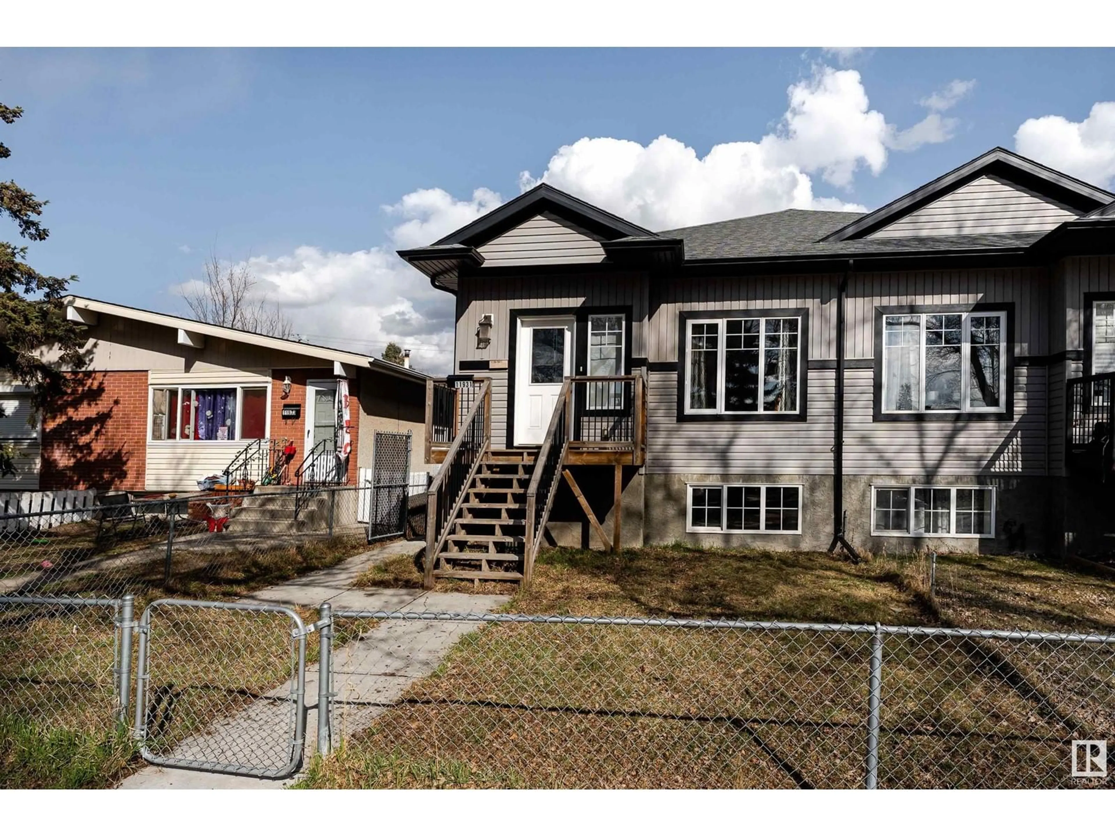 Home with vinyl exterior material, street for NW - 11931 88 ST, Edmonton Alberta T5B3S2