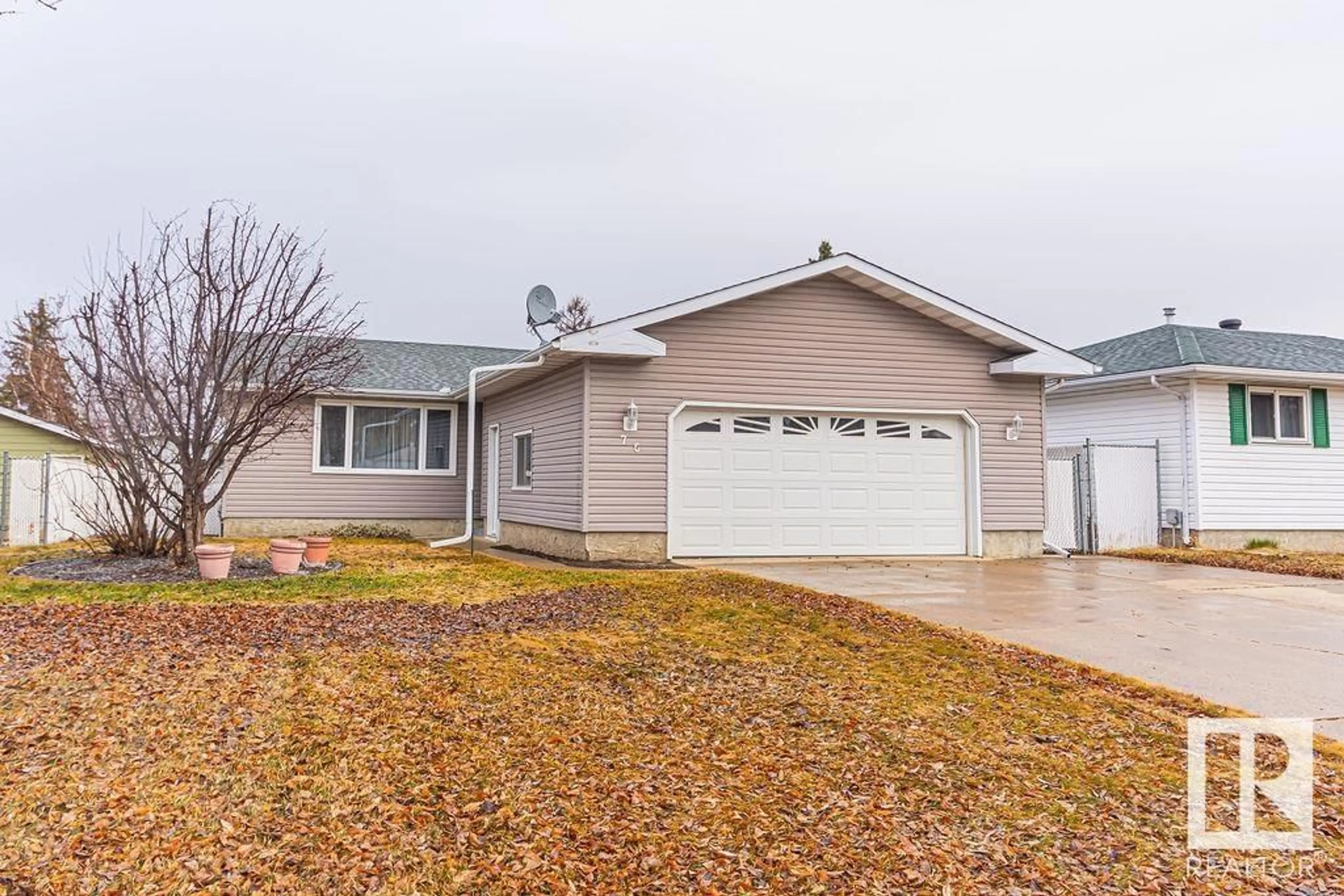 Home with vinyl exterior material, street for 76 NOOTKA RD, Leduc Alberta T9E4H2
