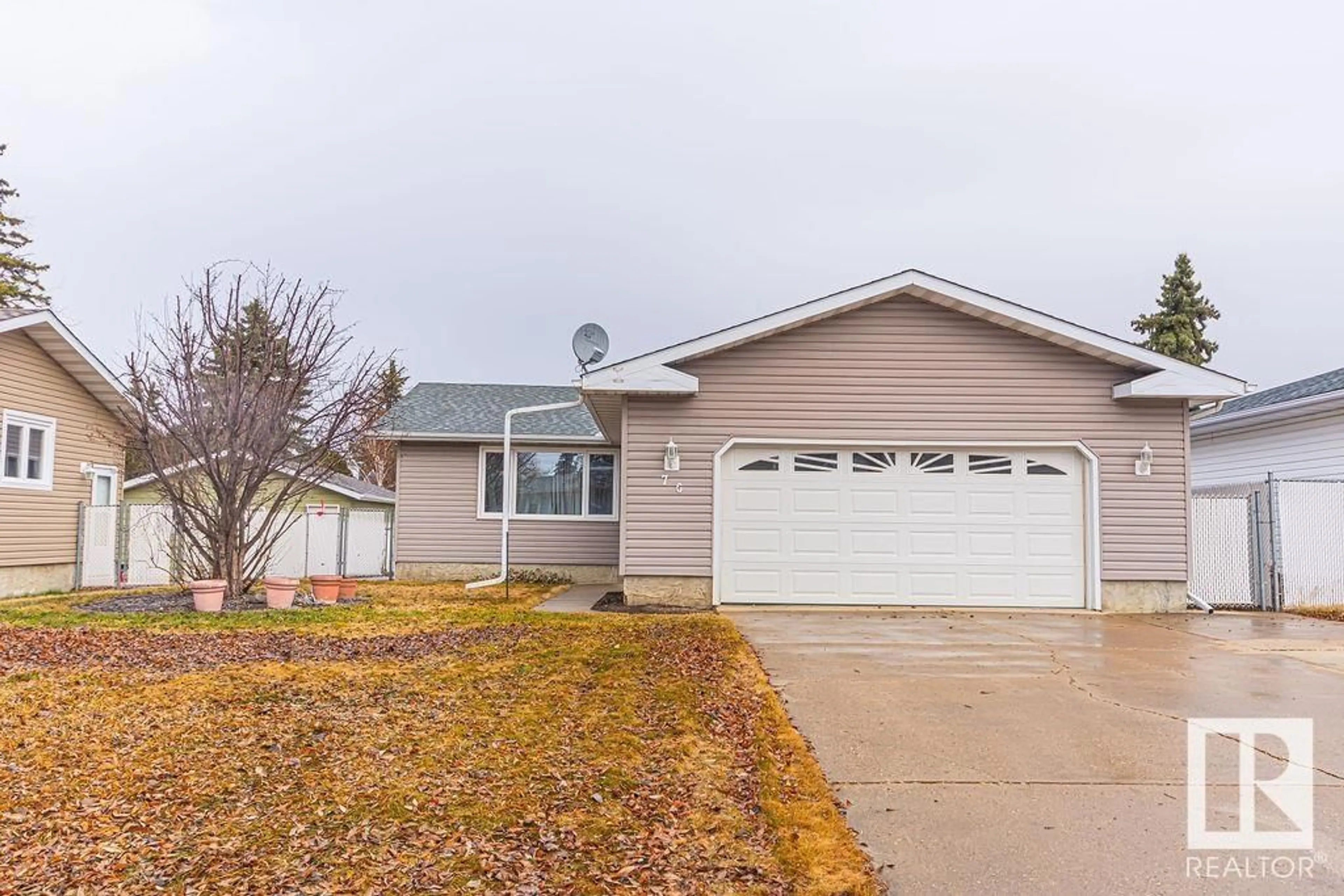 Home with vinyl exterior material, street for 76 NOOTKA RD, Leduc Alberta T9E4H2