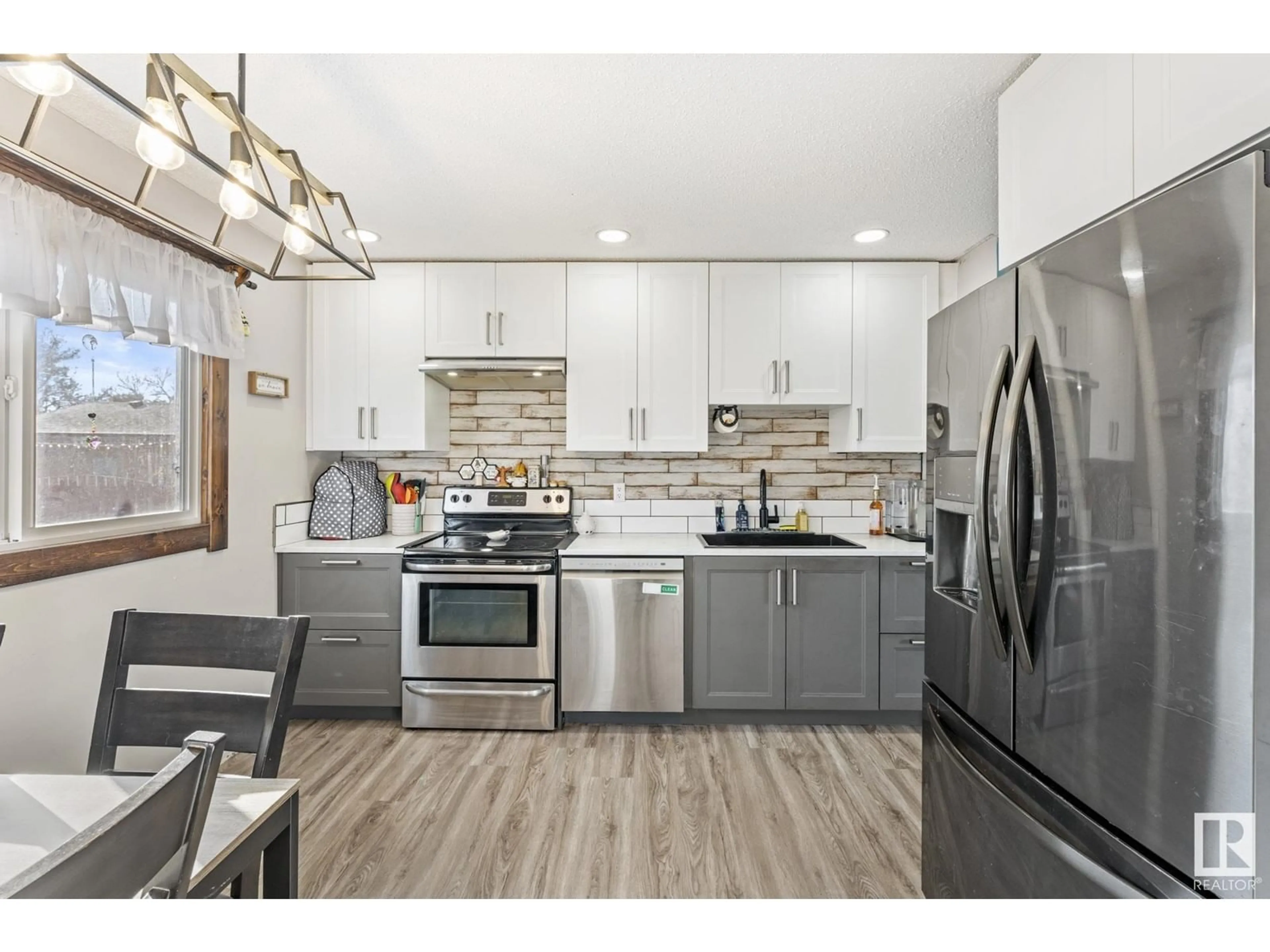 Open concept kitchen, unknown for 17051 98 ST, Edmonton Alberta T5X3G5