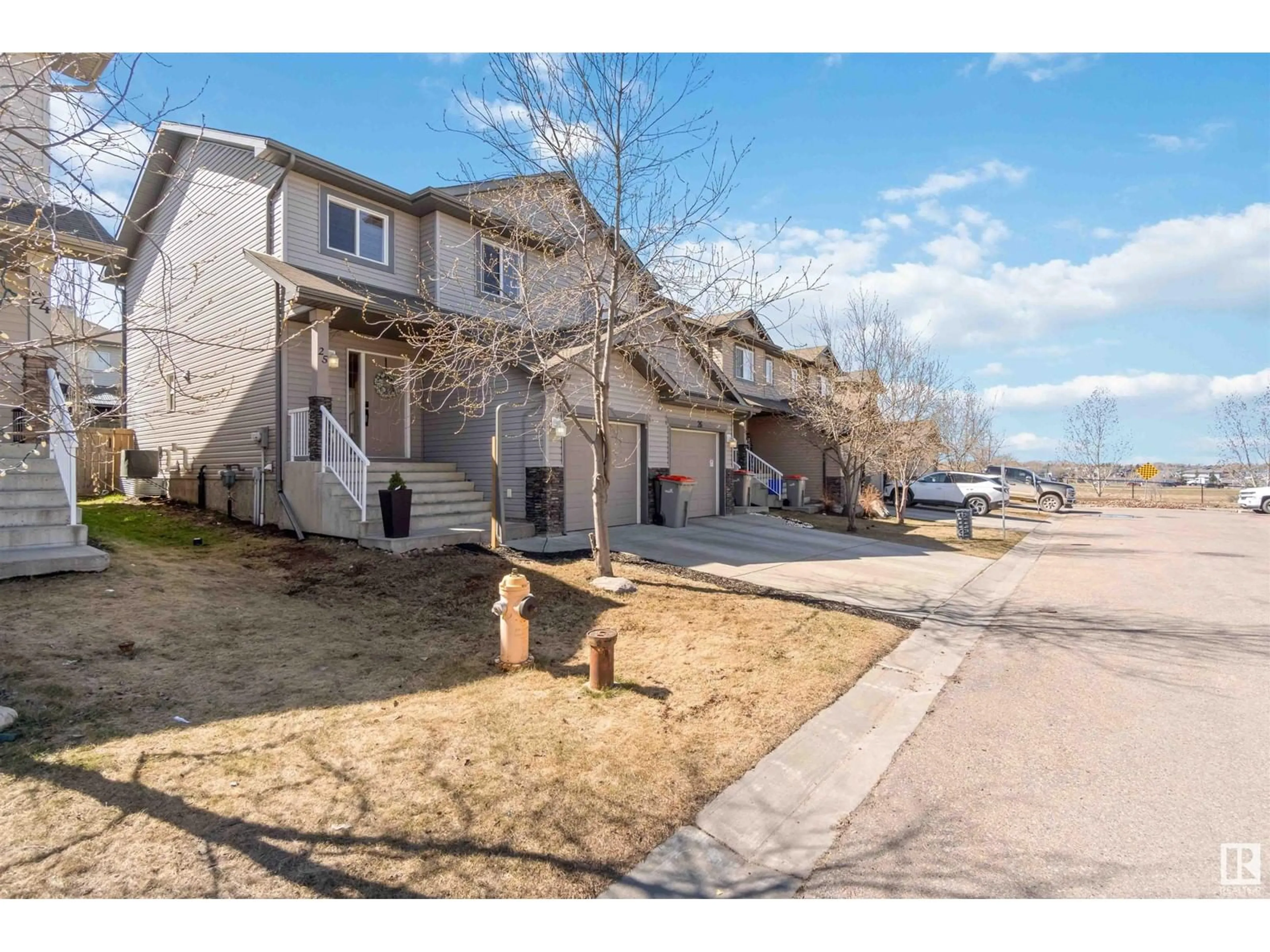 A pic from outside/outdoor area/front of a property/back of a property/a pic from drone, street for 25-85 SPRUCE VILLAGE DR, Spruce Grove Alberta T7X0L2
