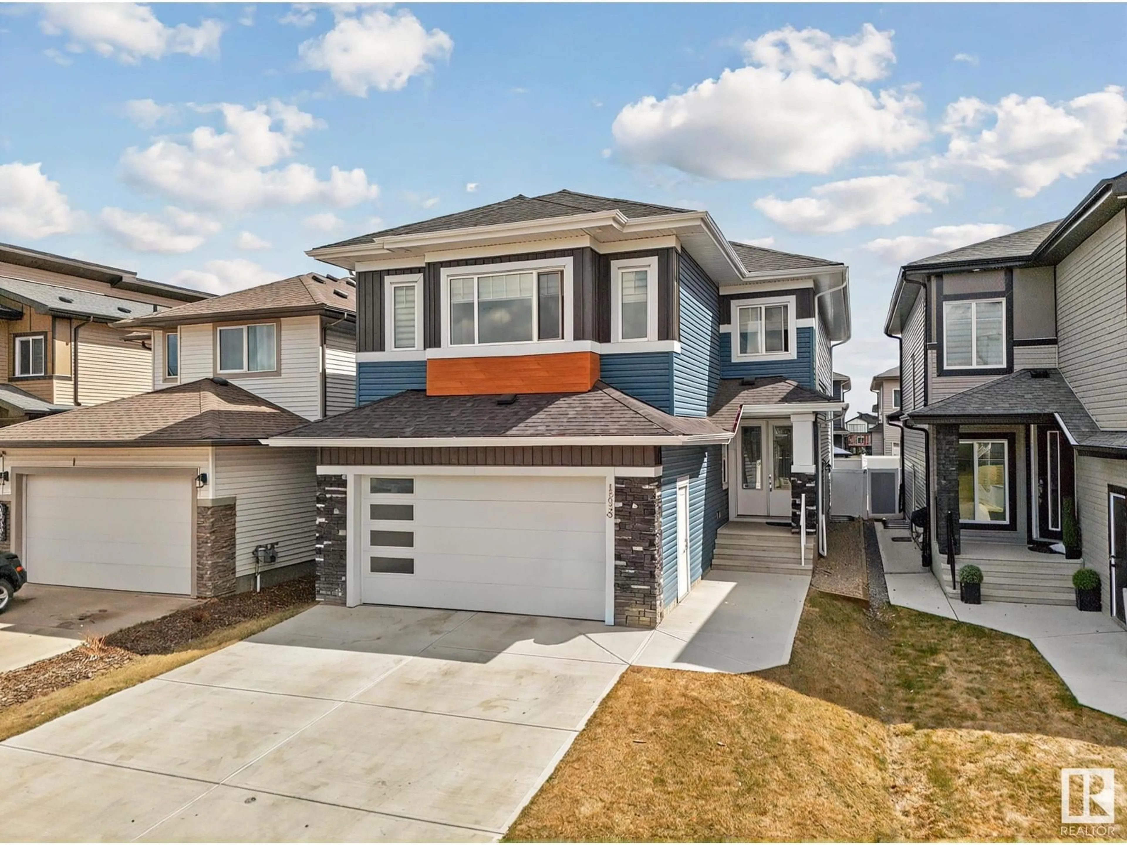 Home with vinyl exterior material, street for 15023 15 ST, Edmonton Alberta T5Y3T4