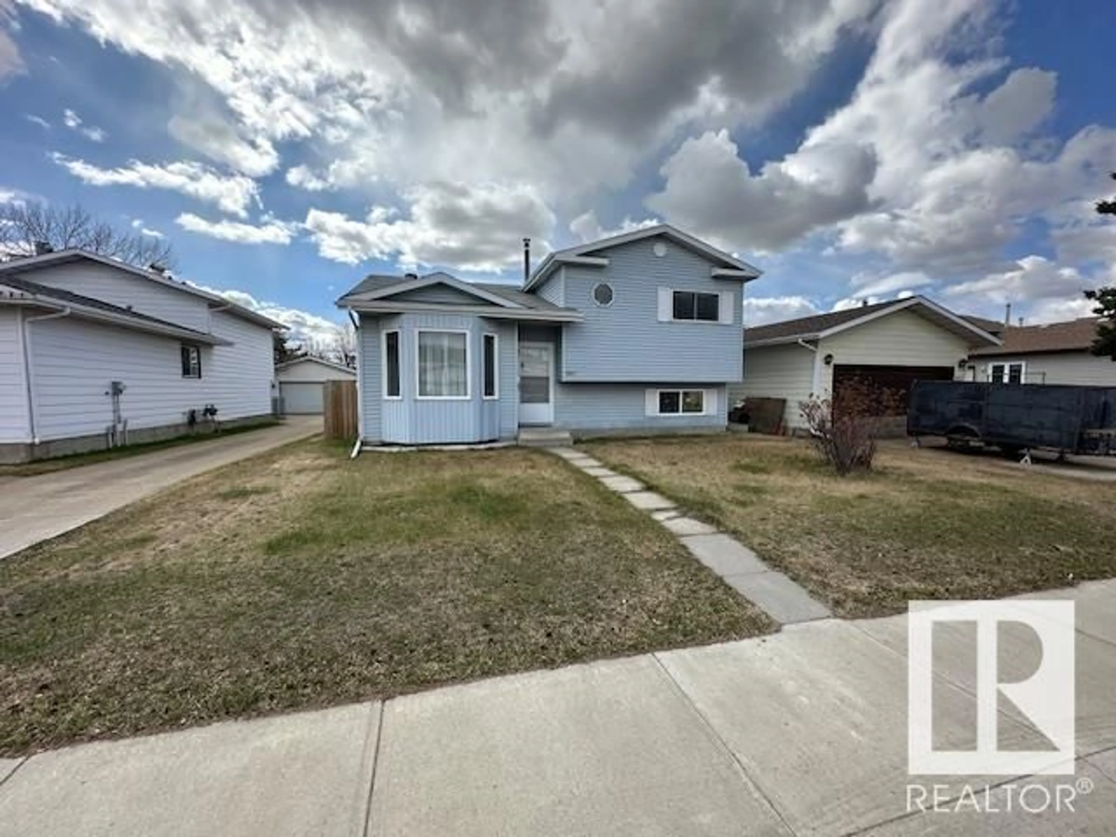 Home with vinyl exterior material, street for NW - 7807 152B AV, Edmonton Alberta T5C3M4