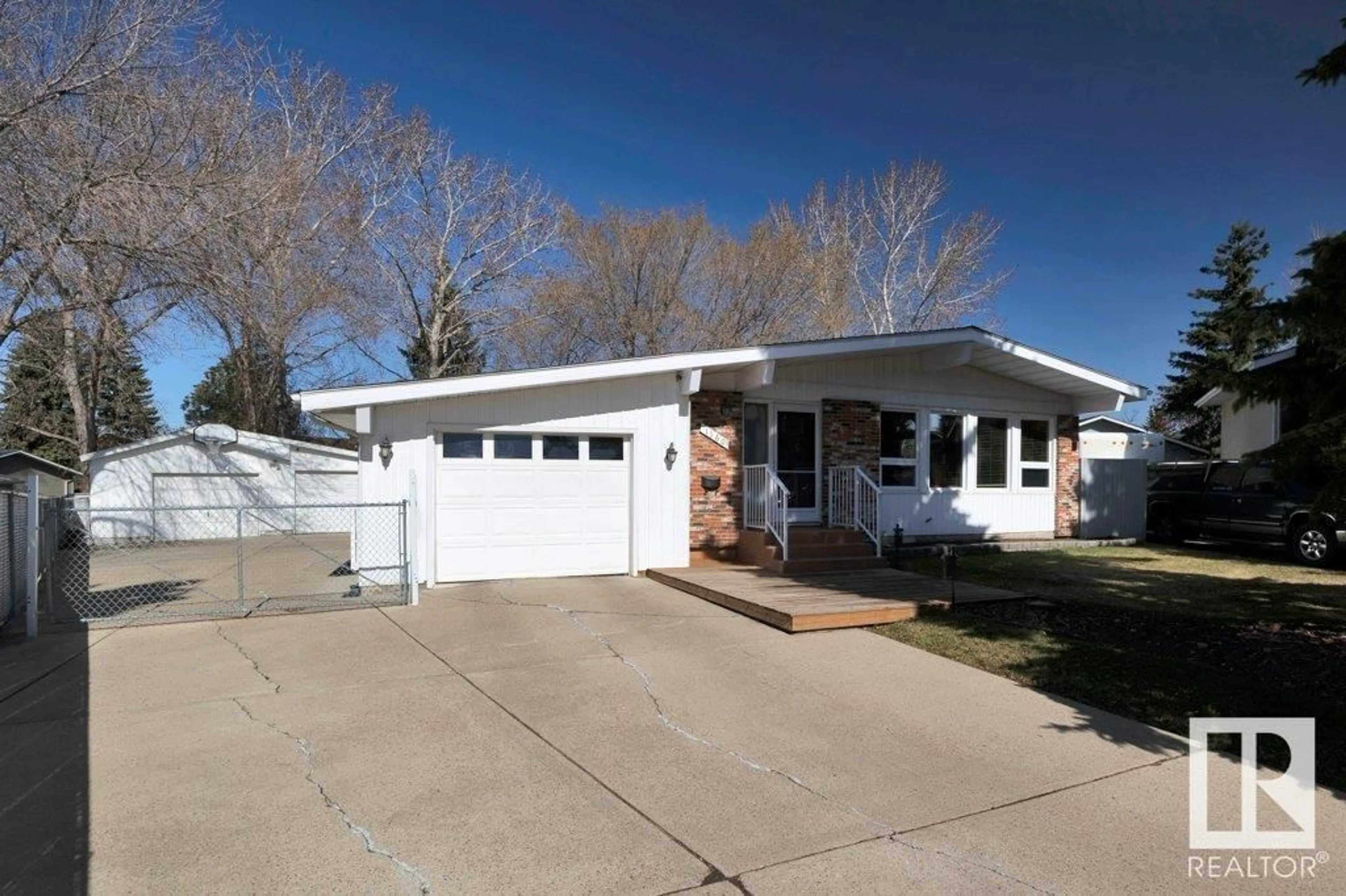 Home with vinyl exterior material, street for 1160 68 ST, Edmonton Alberta T6K3K4