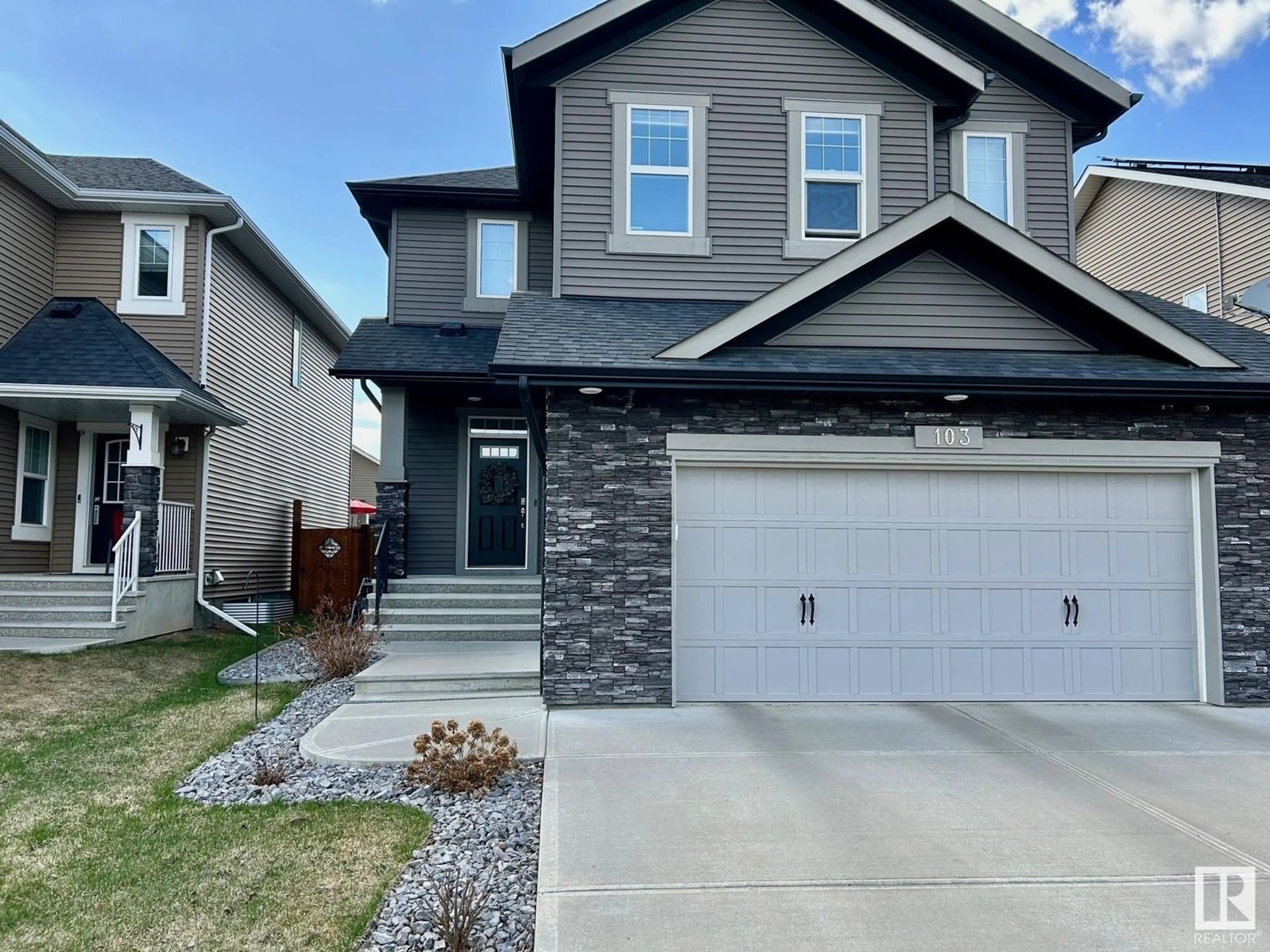 Home with vinyl exterior material, street for 103 ALDRIDGE CR, Sherwood Park Alberta T8H0Y2