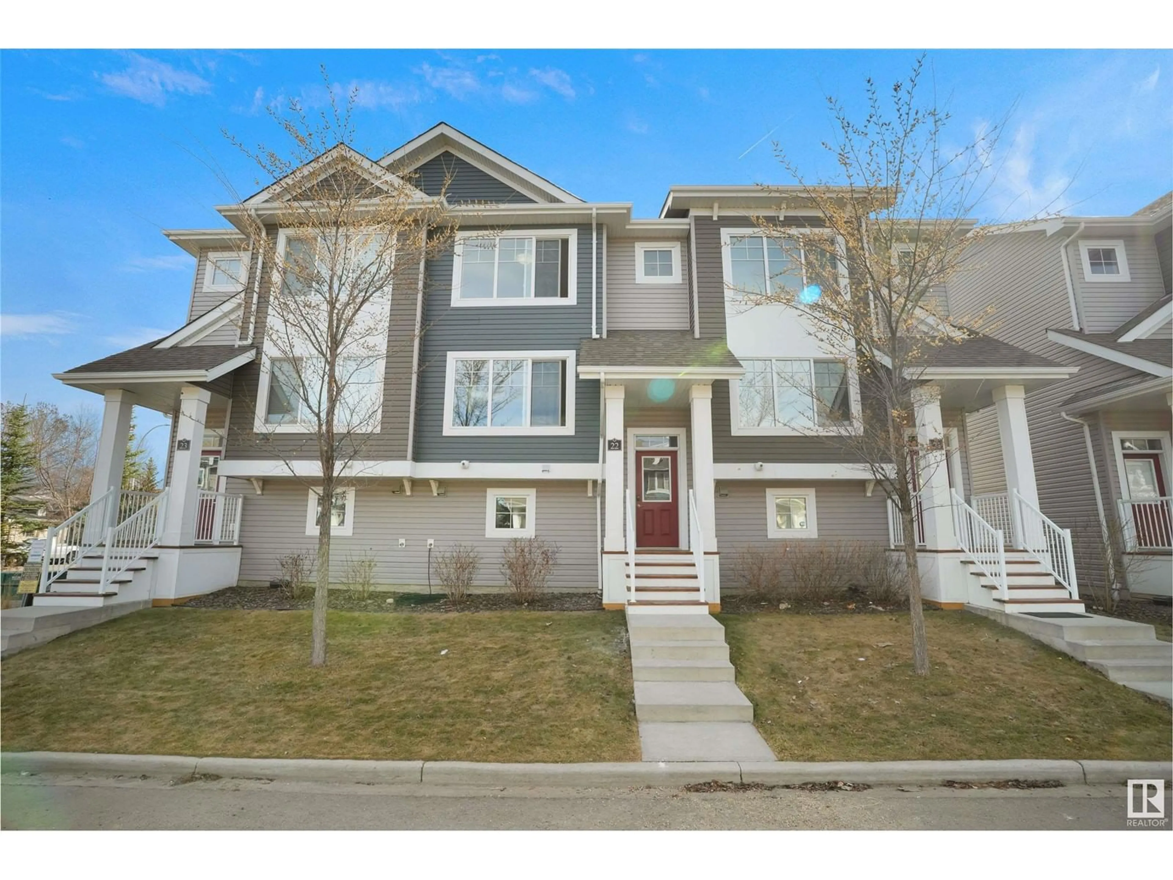 Home with vinyl exterior material, street for 140 - 22 YOUVILLE DR, Edmonton Alberta T6L0A7