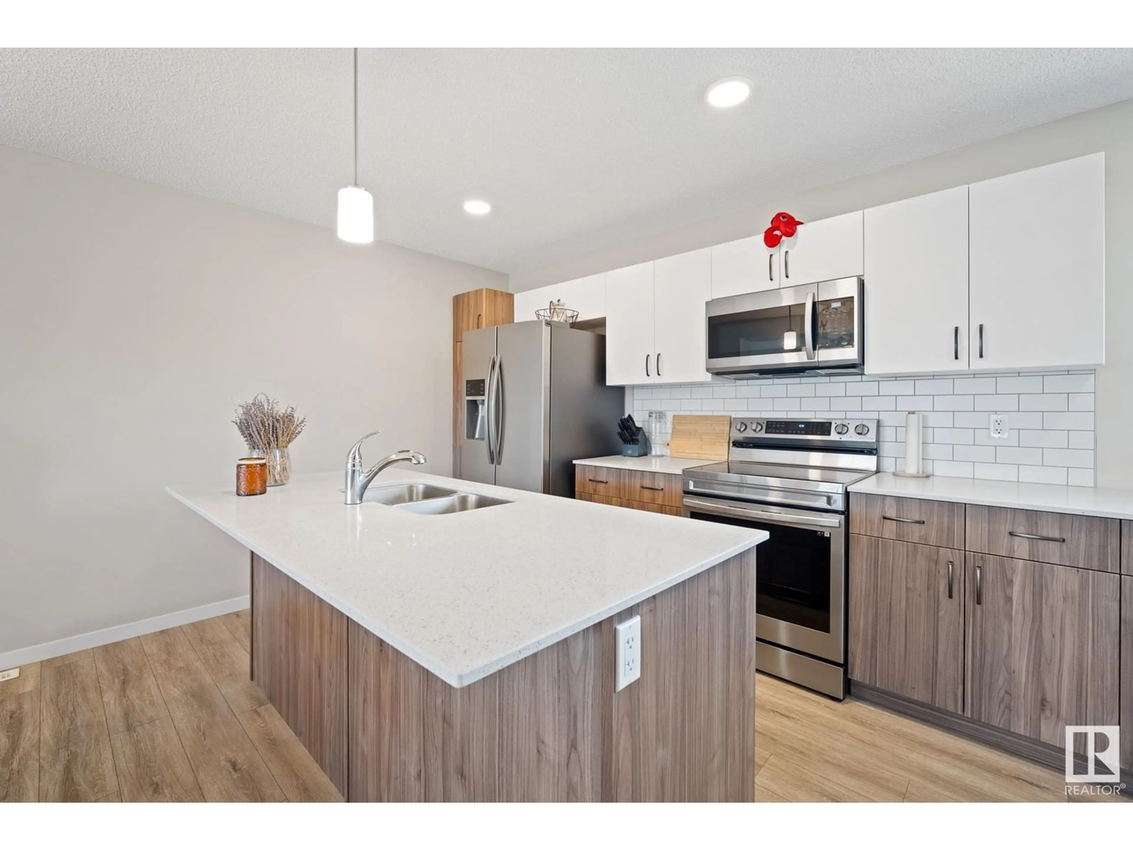 Open concept kitchen, wood/laminate floor for 1103 CY BECKER RD, Edmonton Alberta T5Y4B6