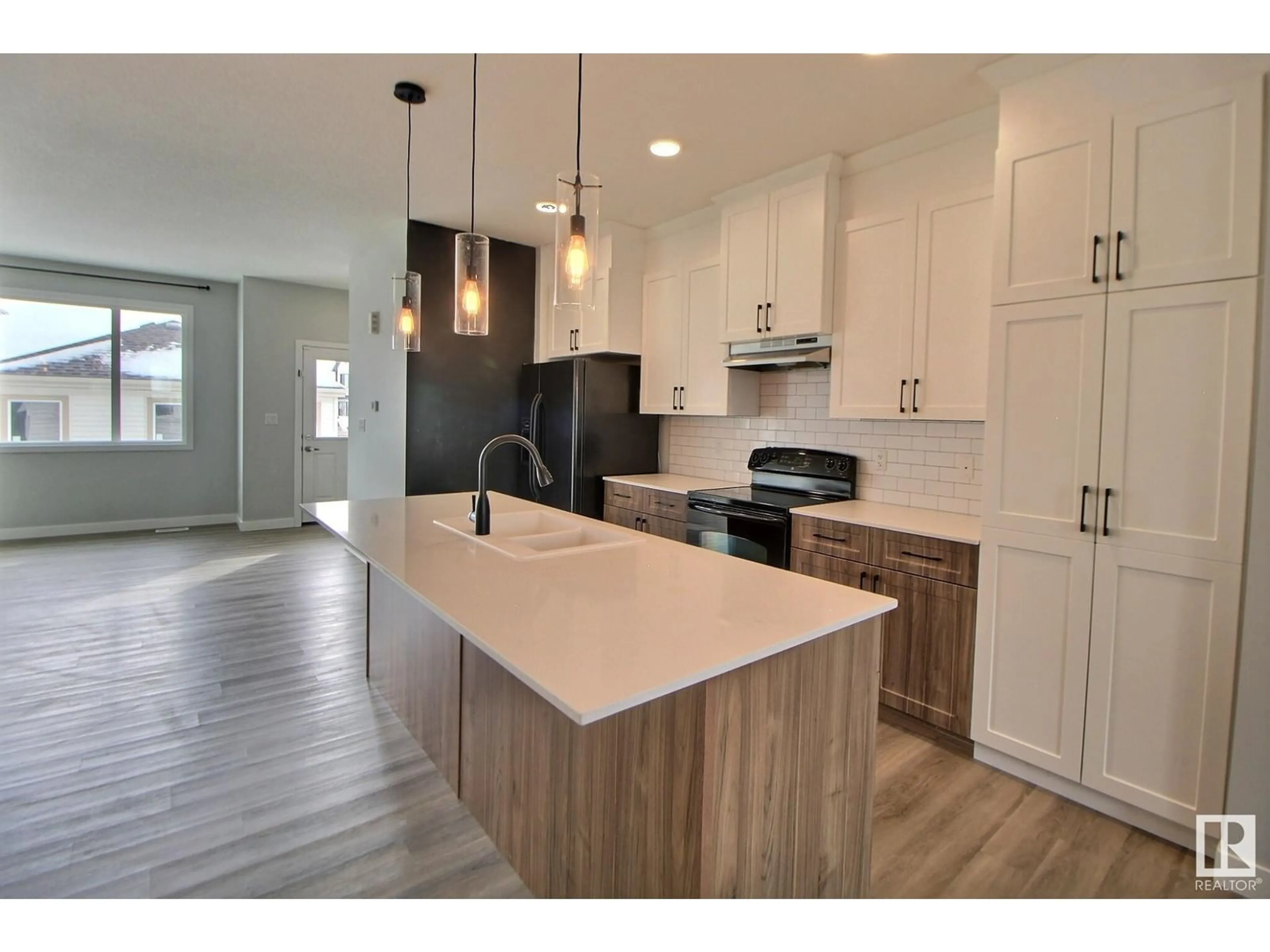Open concept kitchen, wood/laminate floor for NW - 3404 ERLANGER BEND BN, Edmonton Alberta T6M1J6