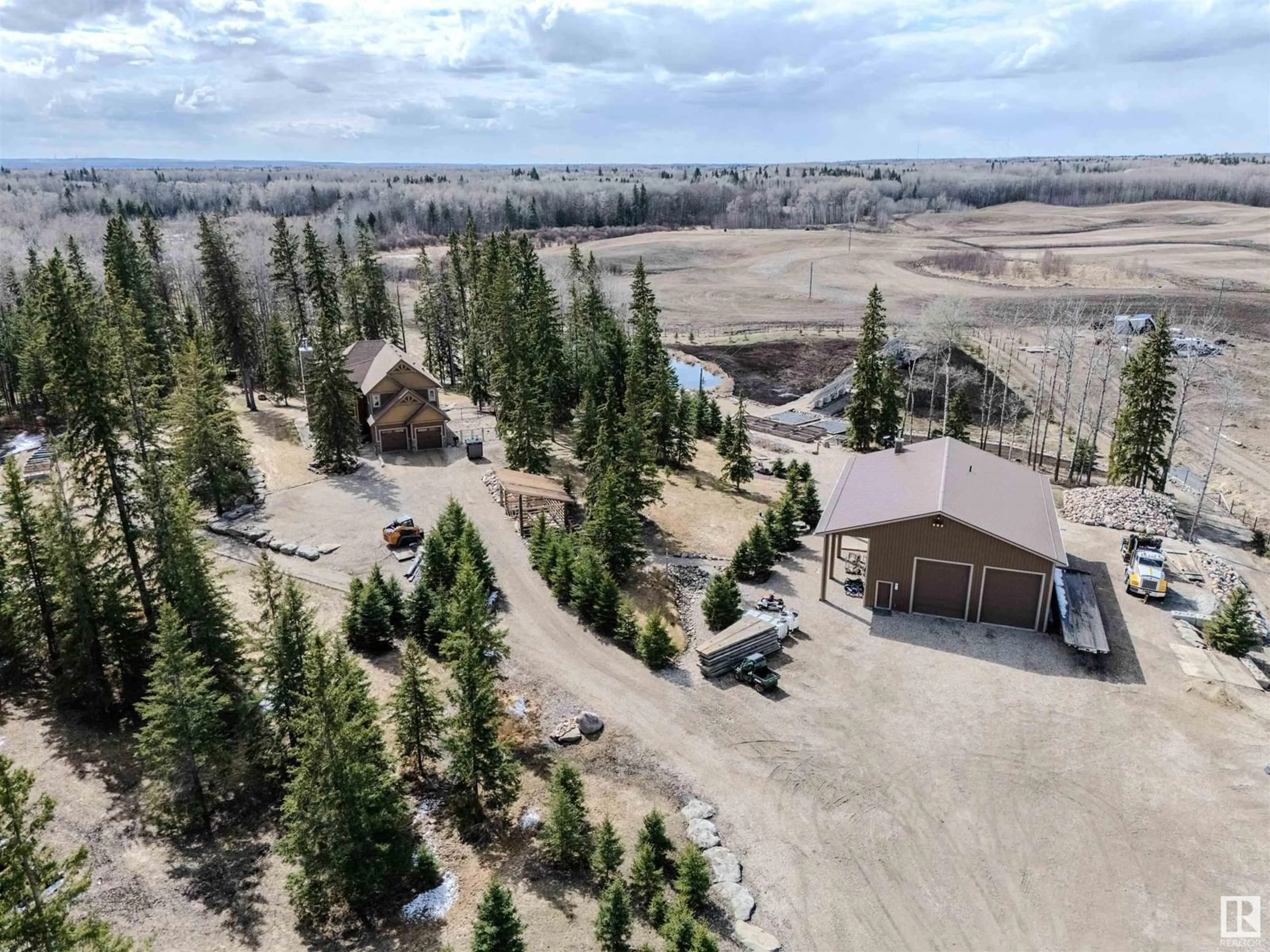 A pic from outside/outdoor area/front of a property/back of a property/a pic from drone, unknown for 53226 RGE ROAD 24, Rural Parkland County Alberta T7Y0C9