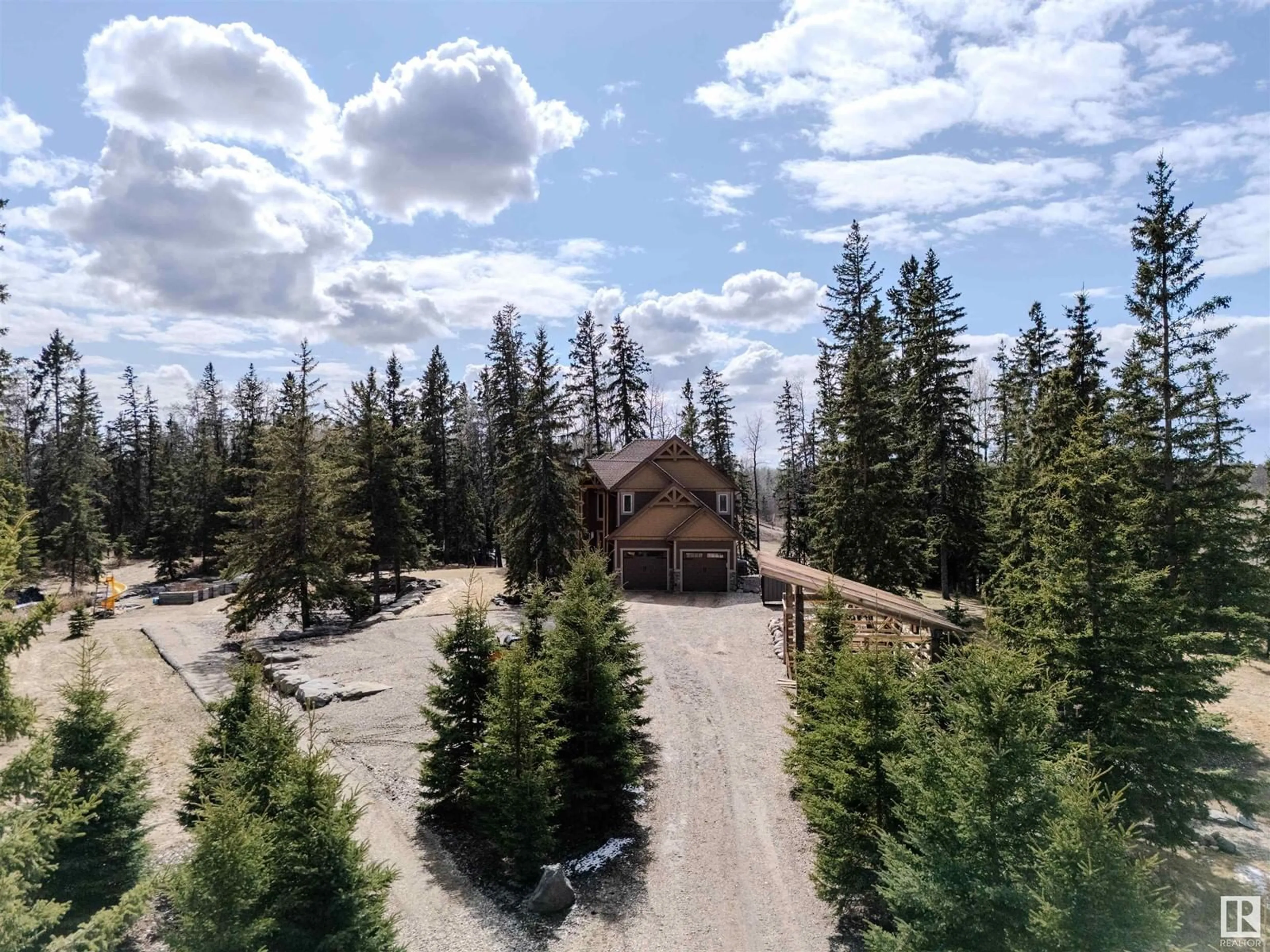 A pic from outside/outdoor area/front of a property/back of a property/a pic from drone, forest/trees view for 53226 RGE ROAD 24, Rural Parkland County Alberta T7Y0C9