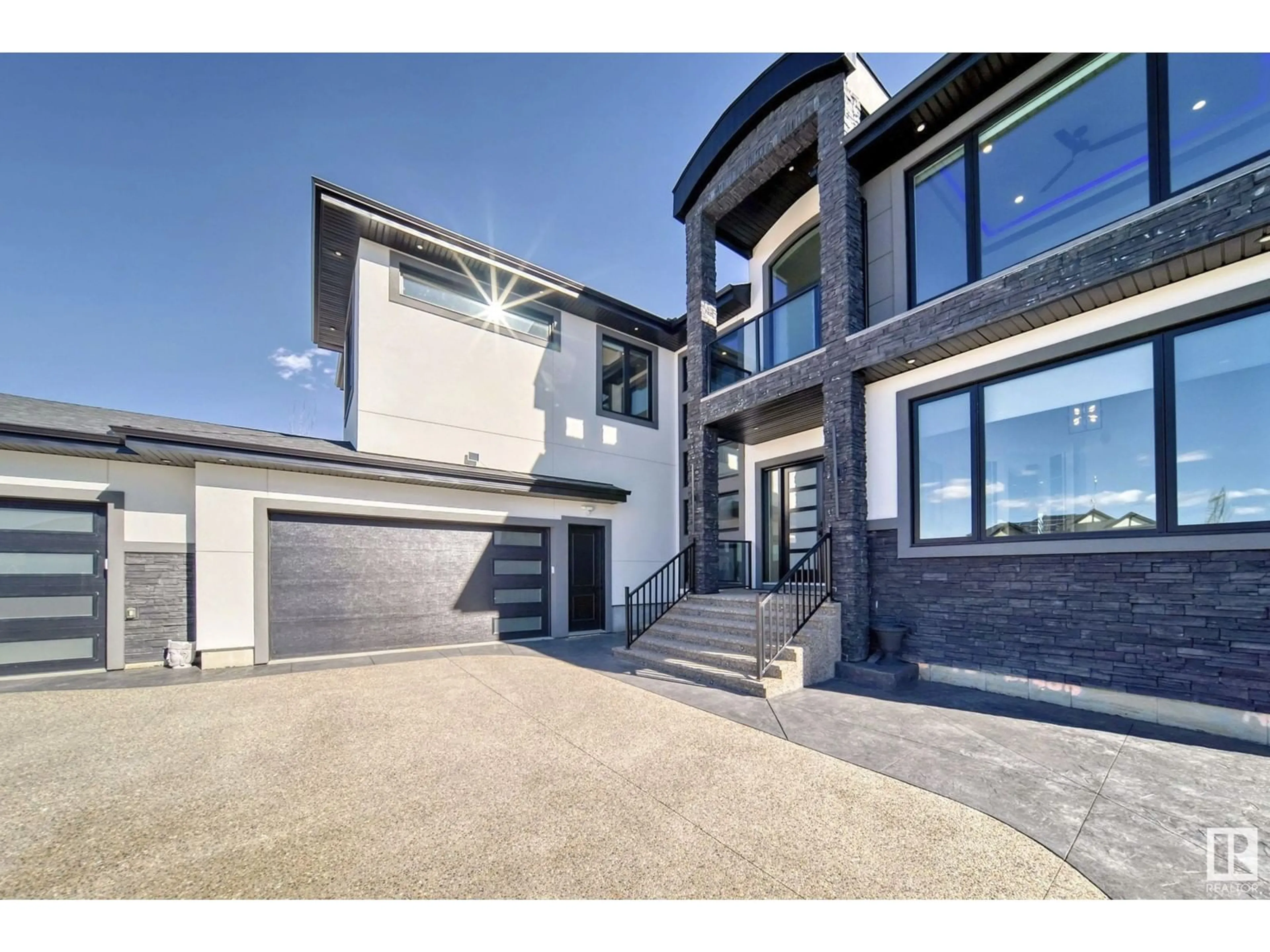 Home with brick exterior material, street for 202 - 53213 RNG RD 261 A, Rural Parkland County Alberta T7Y1A7