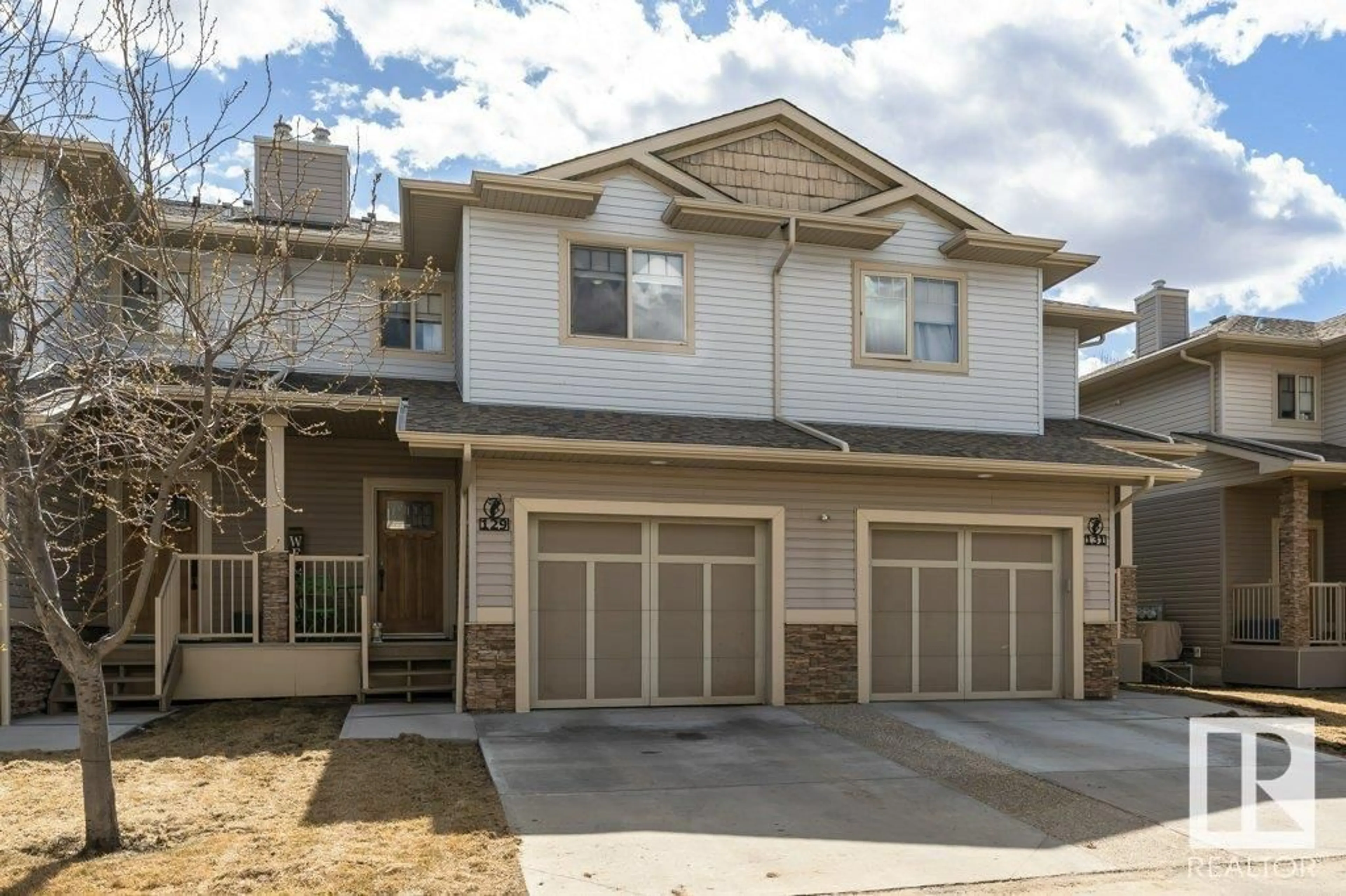 Home with vinyl exterior material, street for 129 - 5420 GRANT MACEWAN BV, Leduc Alberta T9E0M1