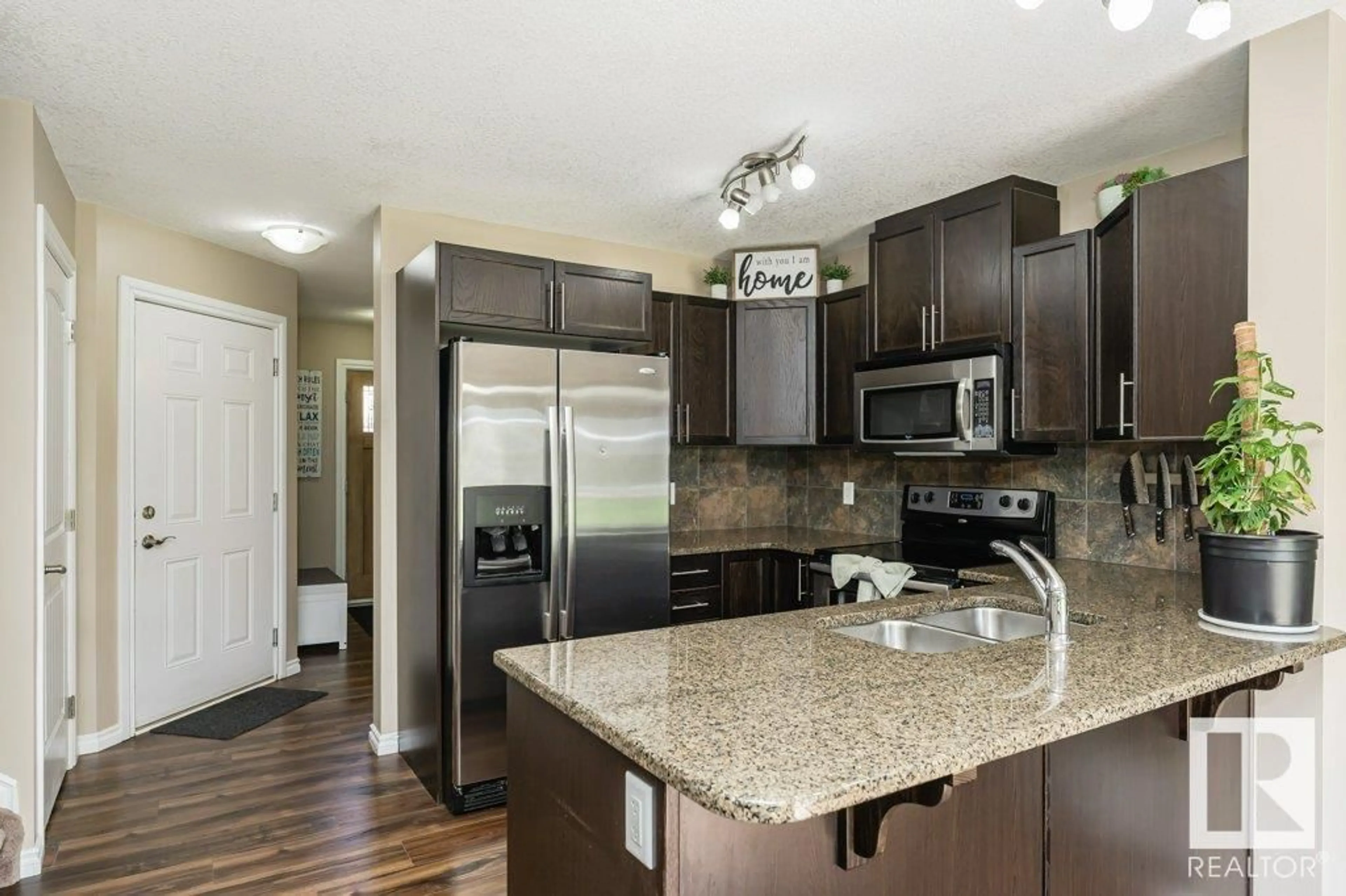 Open concept kitchen, unknown for 129 - 5420 GRANT MACEWAN BV, Leduc Alberta T9E0M1