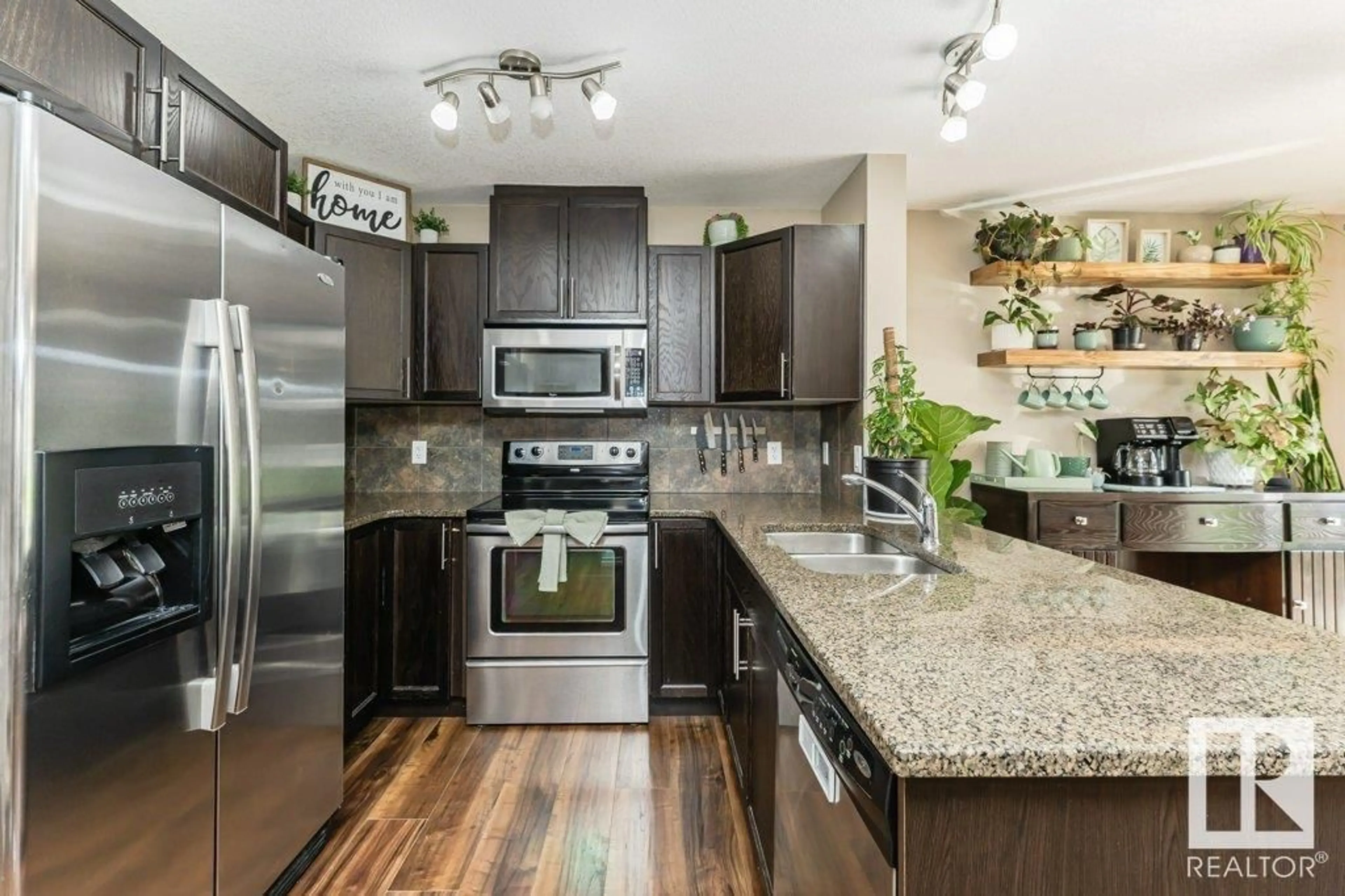 Open concept kitchen, unknown for 129 - 5420 GRANT MACEWAN BV, Leduc Alberta T9E0M1