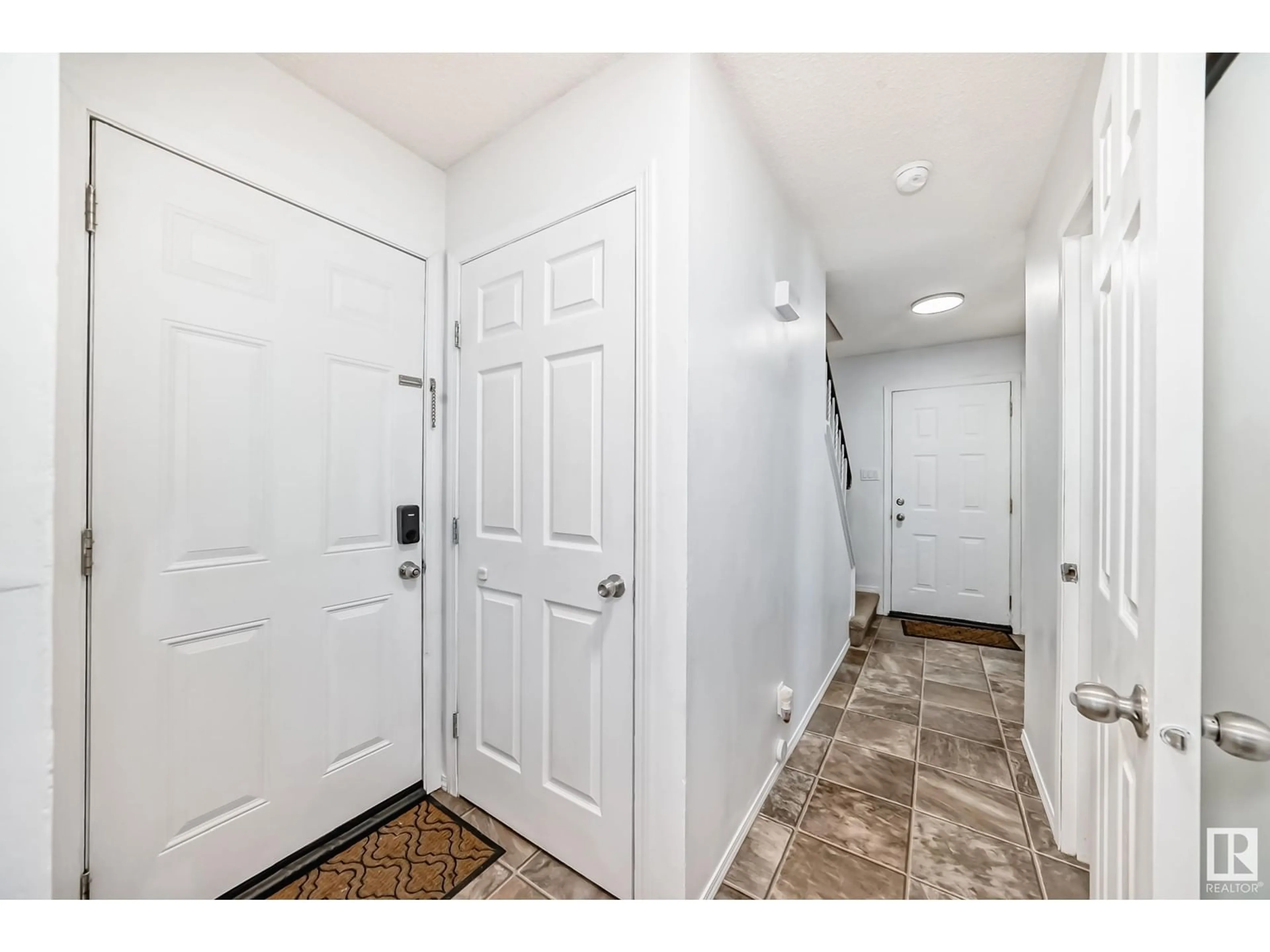 Indoor entryway for 217 CALLINGWOOD TWO NW, Edmonton Alberta T5T1A3