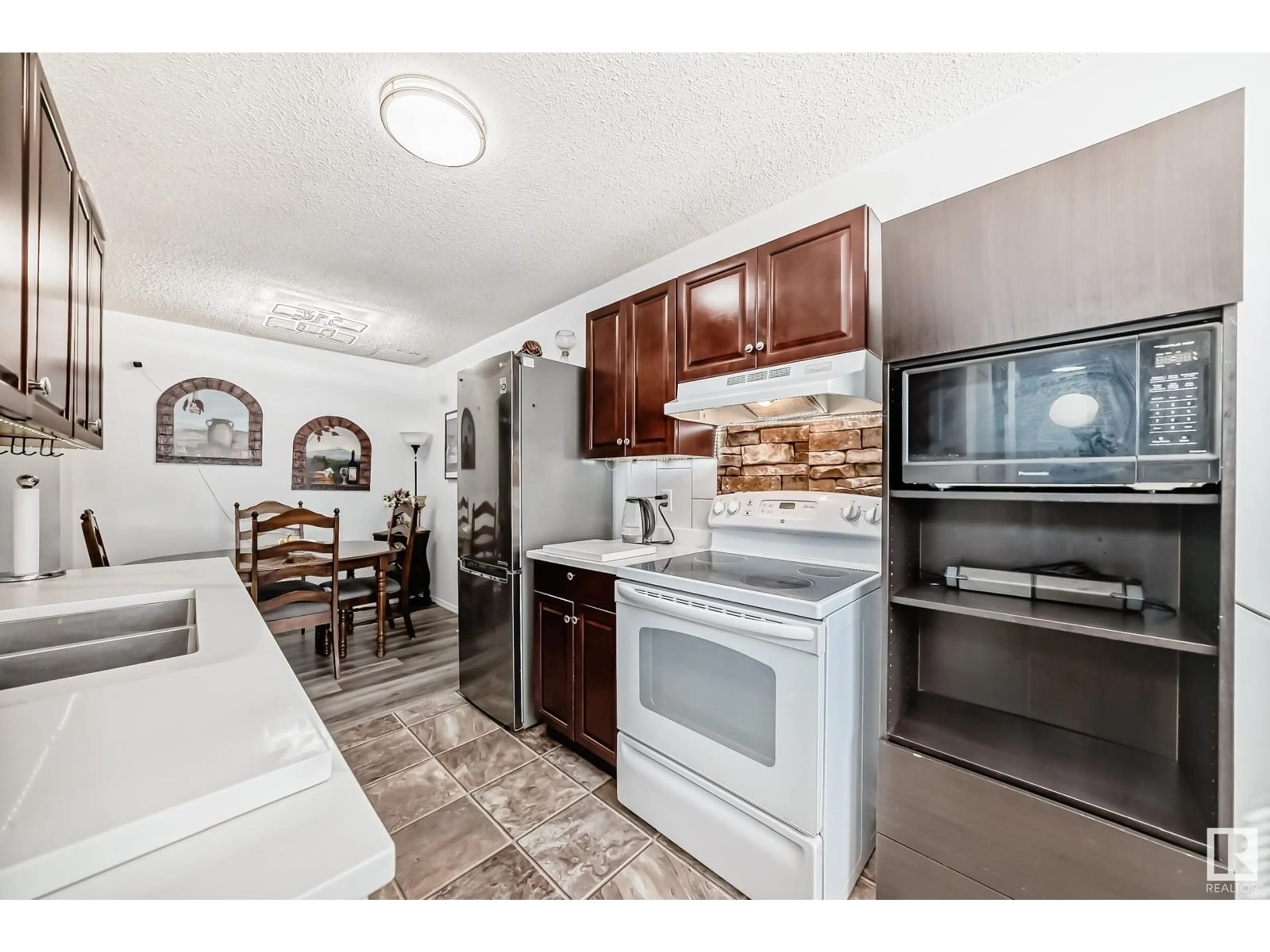 Open concept kitchen, unknown for 217 CALLINGWOOD TWO NW, Edmonton Alberta T5T1A3