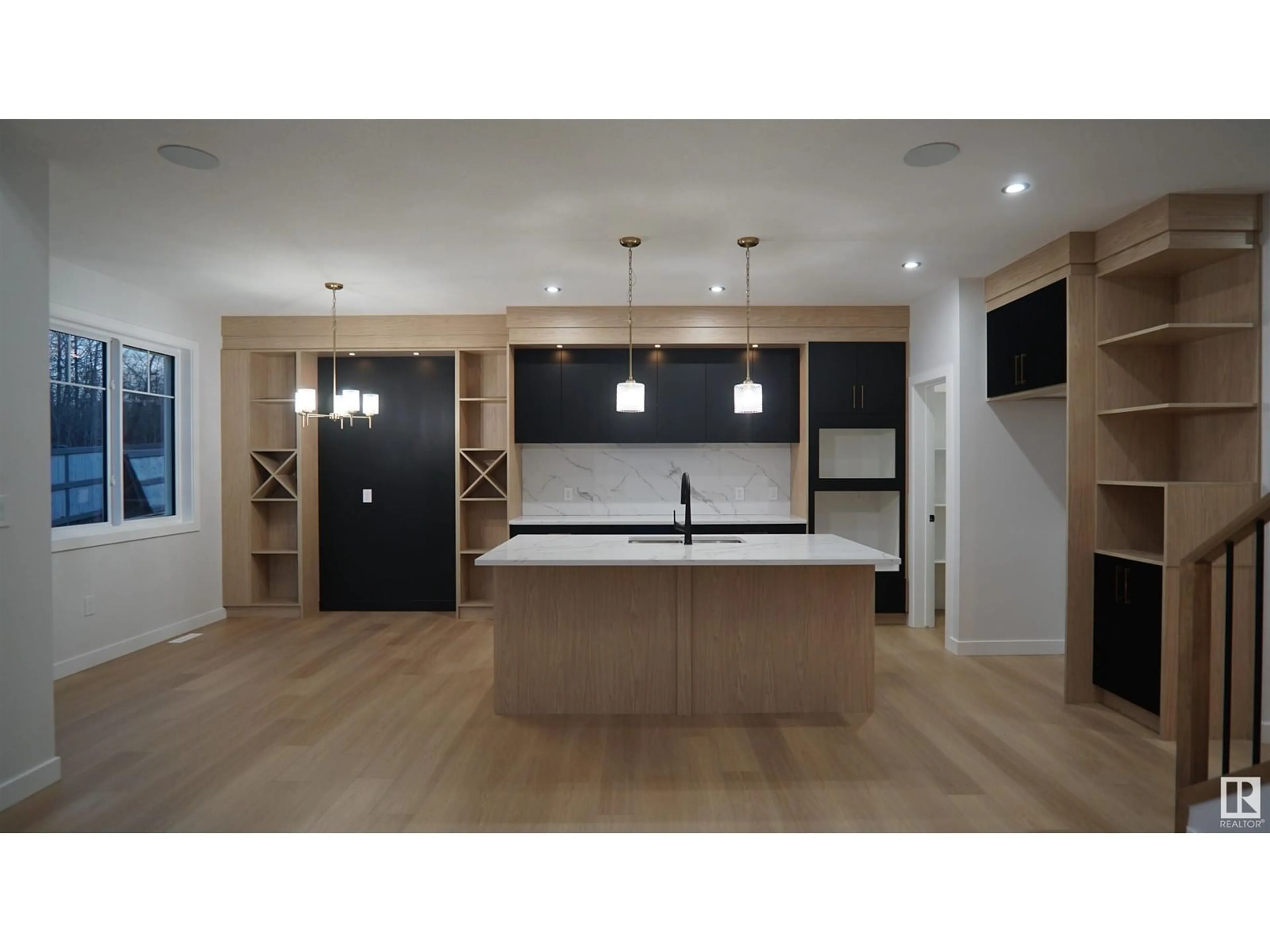Open concept kitchen, wood/laminate floor for 17 ASHBURY CR, Spruce Grove Alberta T7X3C6