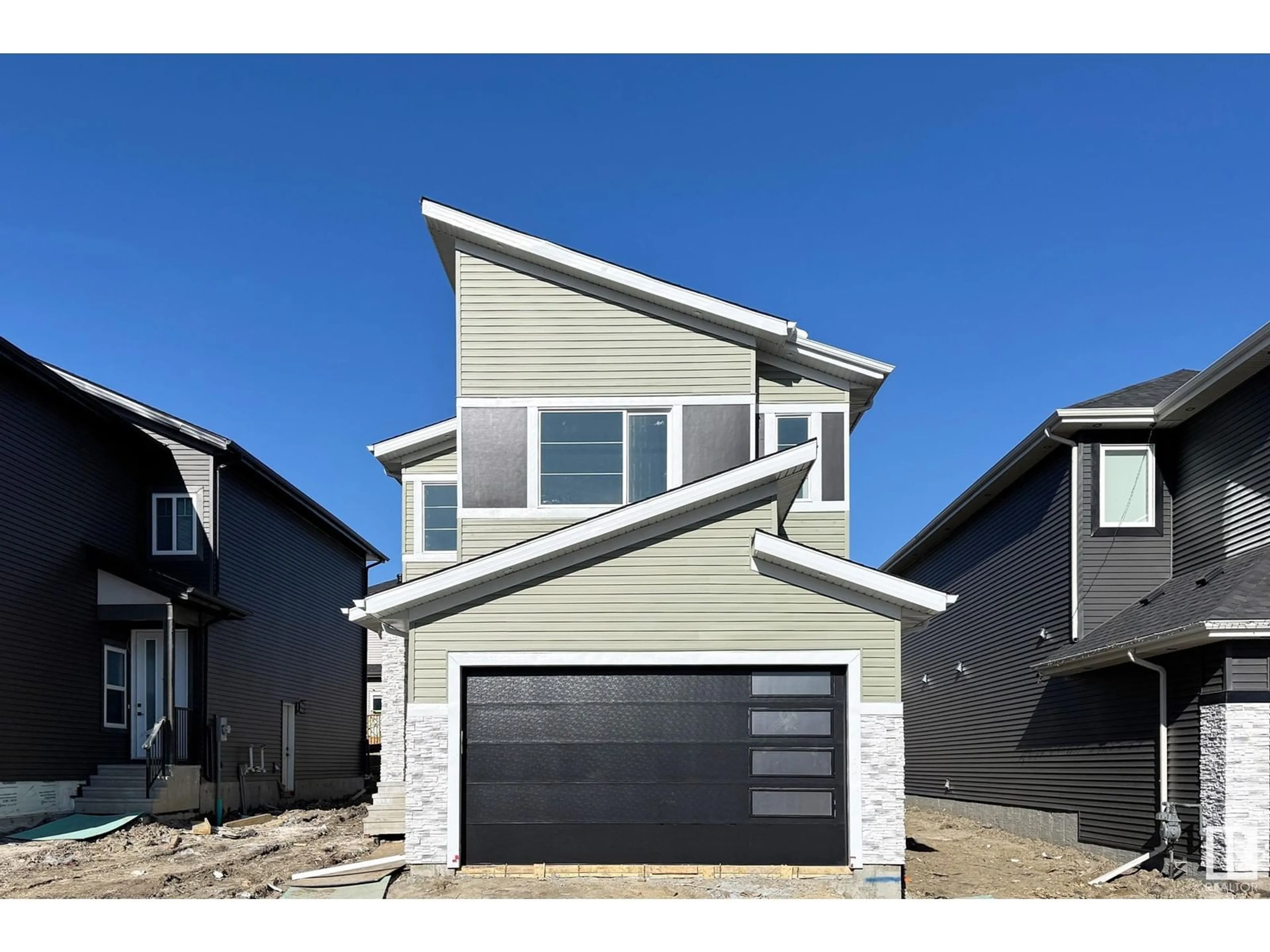 Home with vinyl exterior material, street for 5943 17 ST, Rural Leduc County Alberta T4X3C4