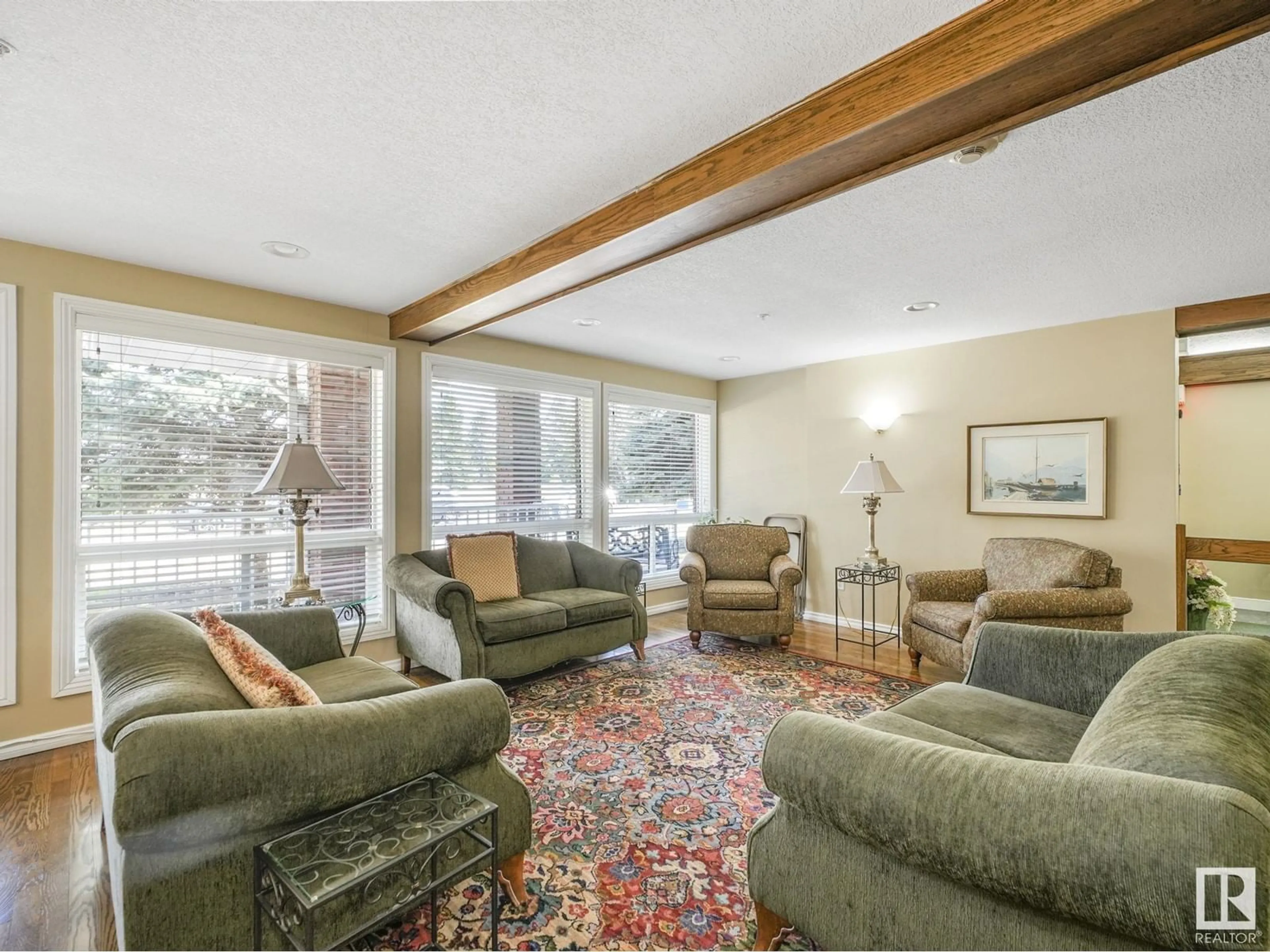 Living room with furniture, carpet floor for 129 6220 FULTON RD, Edmonton Alberta T6A3T4